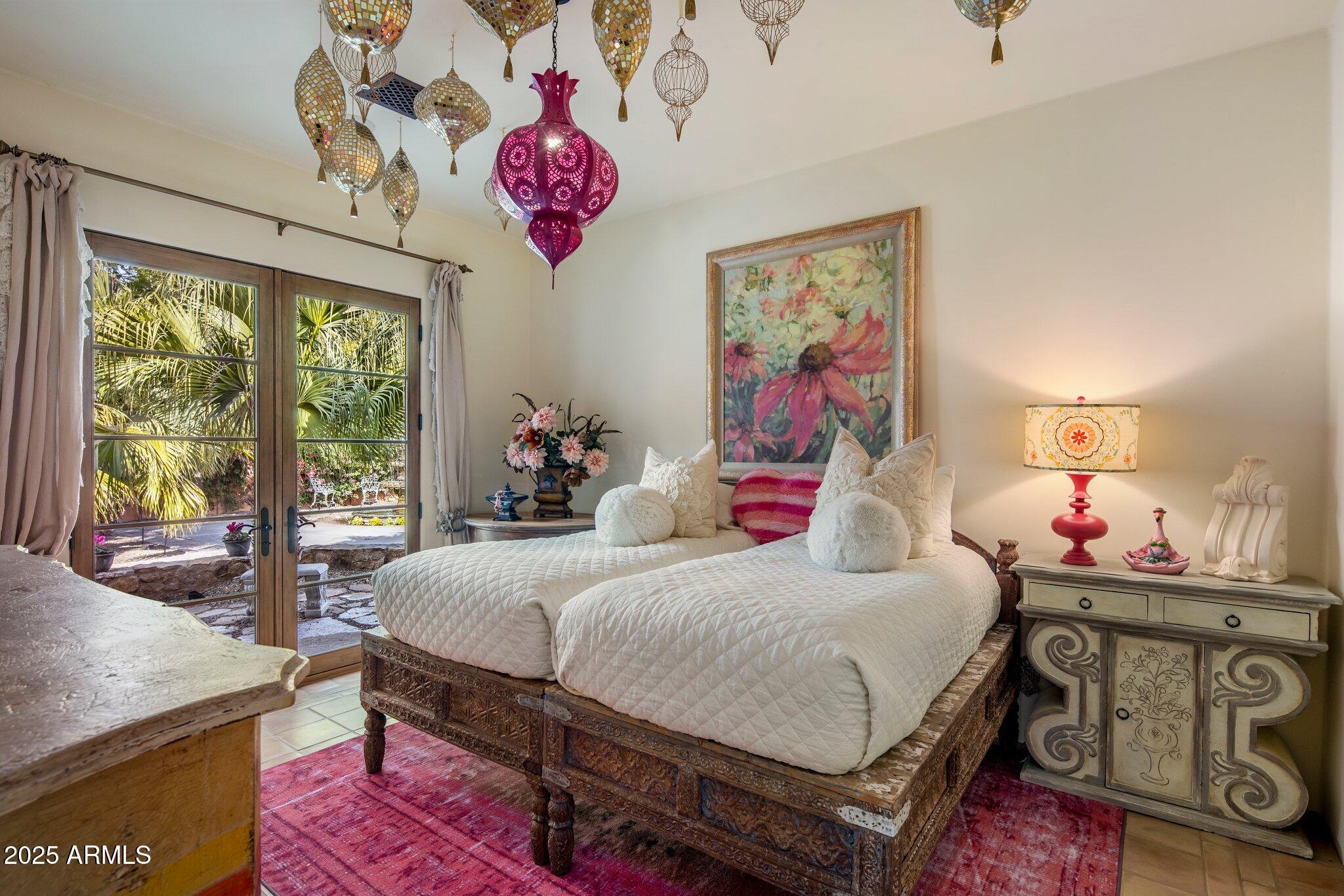 66 Biltmore Estates Drive Phoenix, AZ 85016 - Photo 34 of 54 a bedroom with a bed and a table