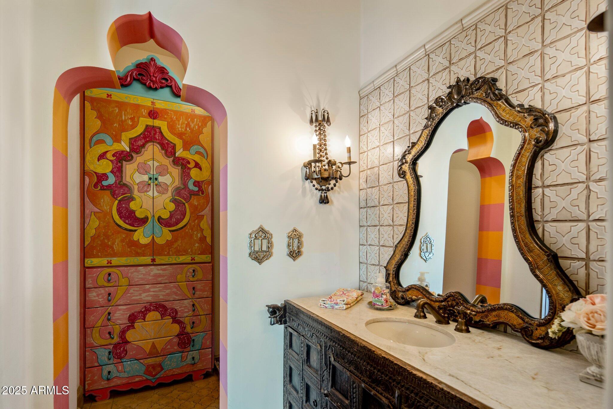 66 Biltmore Estates Drive Phoenix, AZ 85016 - Photo 35 of 54 a bathroom with a sink and a mirror
