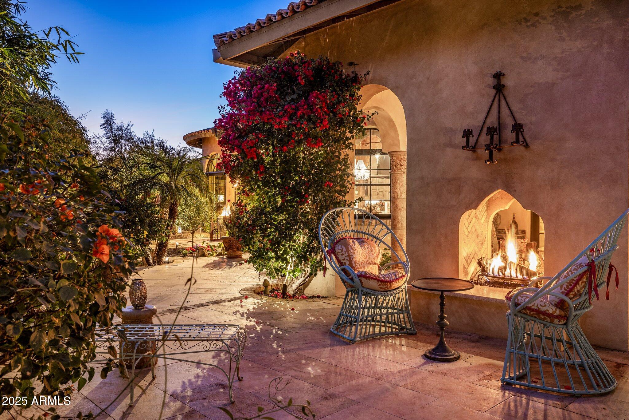 66 Biltmore Estates Drive Phoenix, AZ 85016 - Photo 50 of 54 a view of a chair and table in the patio