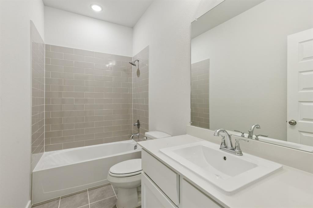 1469 Barbacoa Drive Haslet, TX 76052 - Photo 28 of 35 a bathroom with a sink toilet and shower