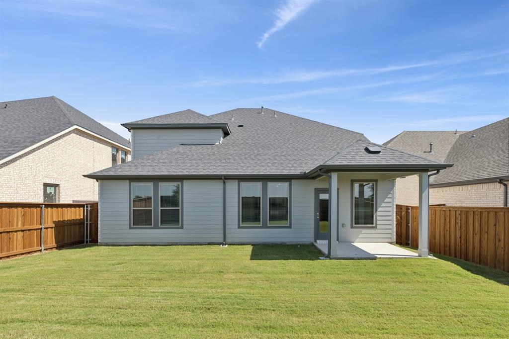 1469 Barbacoa Drive Haslet, TX 76052 - Photo 33 of 35 a house view with a garden space