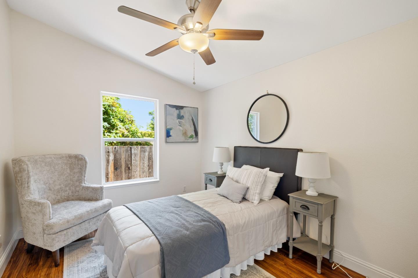 14685 Oka Road, Unit 62 Los Gatos, CA 95032 - Photo 16 of 27 a bedroom with bed and a window