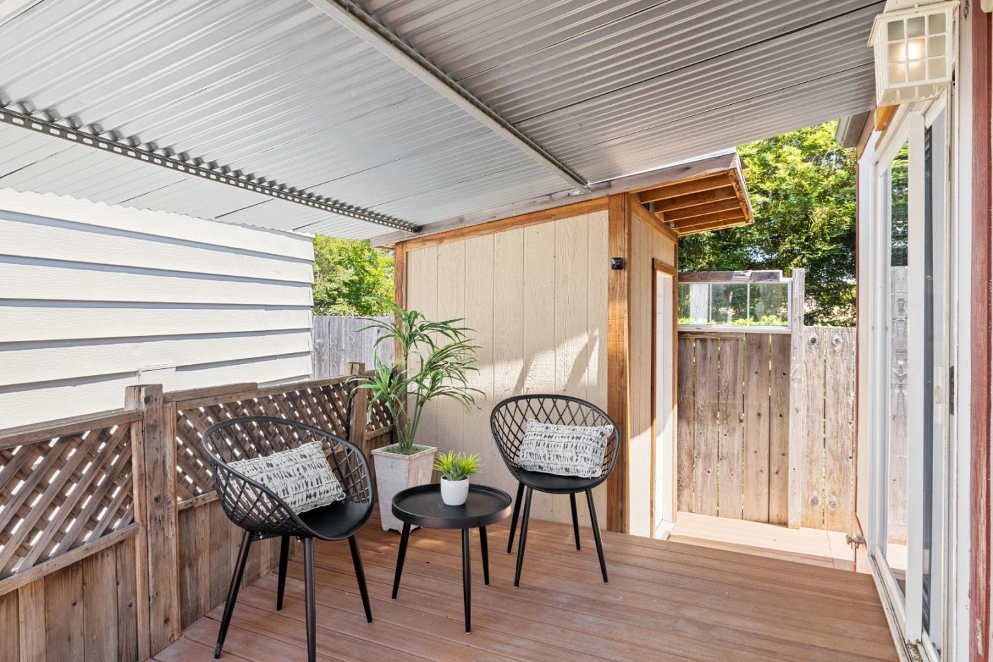 14685 Oka Road, Unit 62 Los Gatos, CA 95032 - Photo 20 of 27 a view of a chairs and table in the balcony