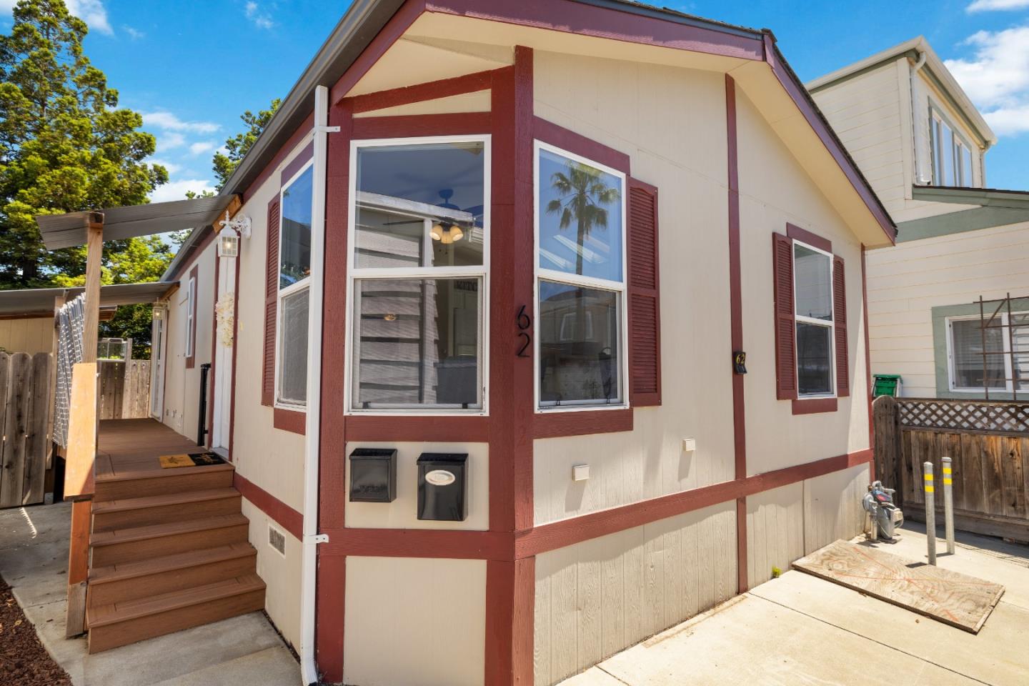 14685 Oka Road, Unit 62 Los Gatos, CA 95032 - Photo 24 of 27 a view of a house with wooden floor and stairs