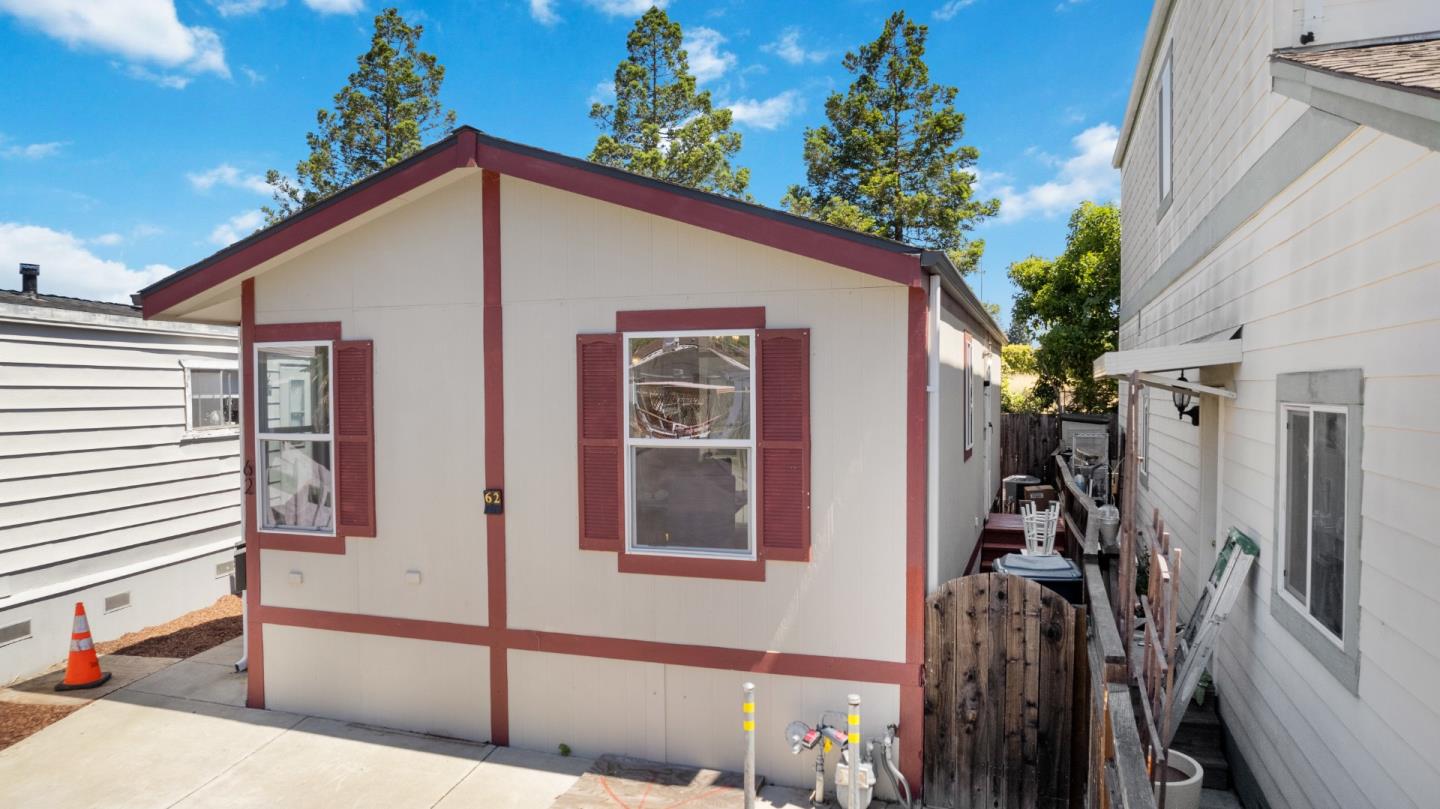 14685 Oka Road, Unit 62 Los Gatos, CA 95032 - Photo 26 of 27 a view of a house with a garage