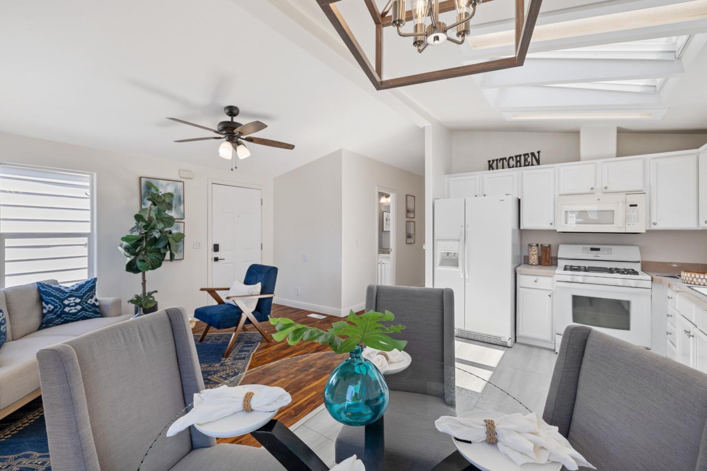 14685 Oka Road, Unit 62 Los Gatos, CA 95032 - Photo 4 of 27 a living room with furniture fireplace and a window