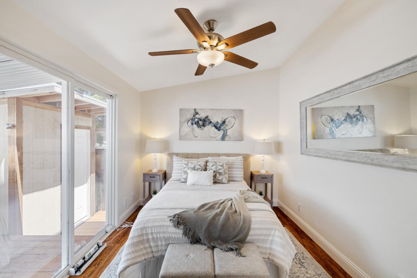 14685 Oka Road, Unit 62 Los Gatos, CA 95032 - Photo 10 of 27 a bedroom with furniture and a large window