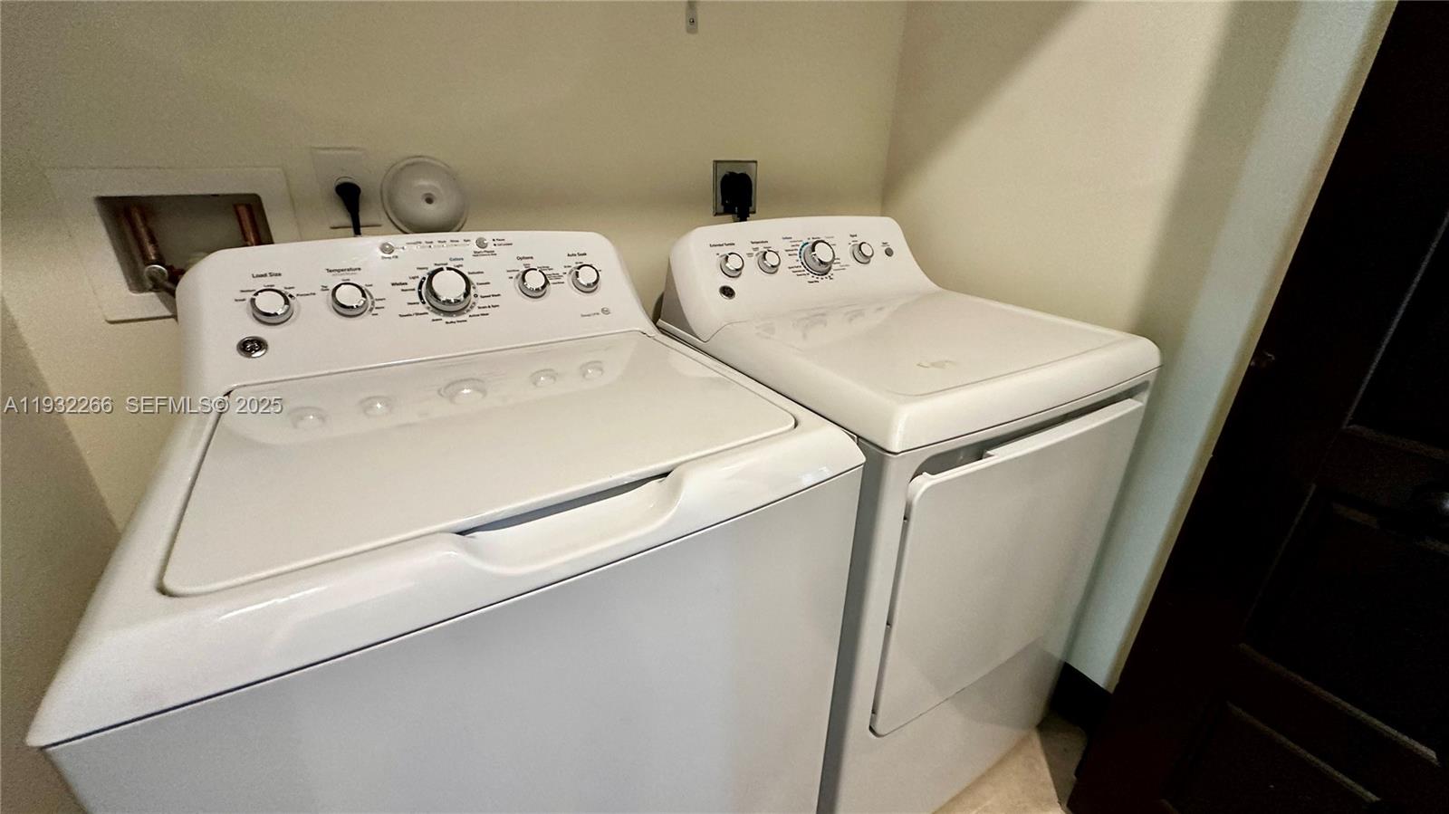 9155 Northwest 161st Street Miami Lakes, FL 33018 - Photo 43 of 51 a utility room with dryer and washer