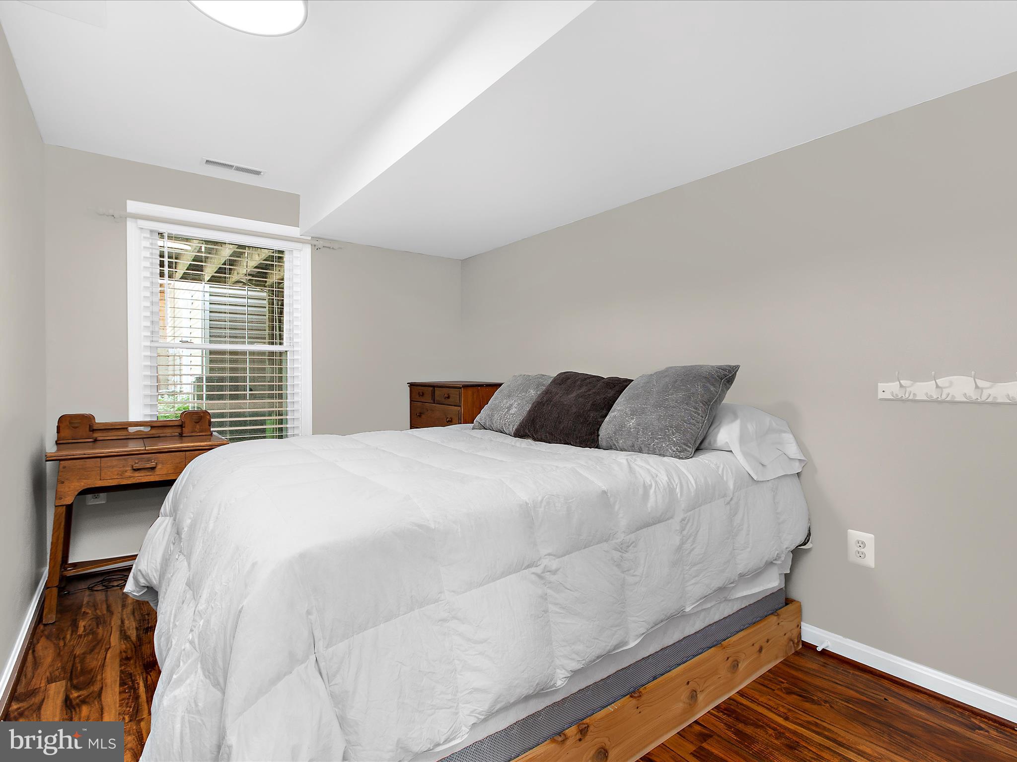 1217 Somerset Road Severn, MD 21144 - Photo 29 of 86 a bedroom with a bed and a window