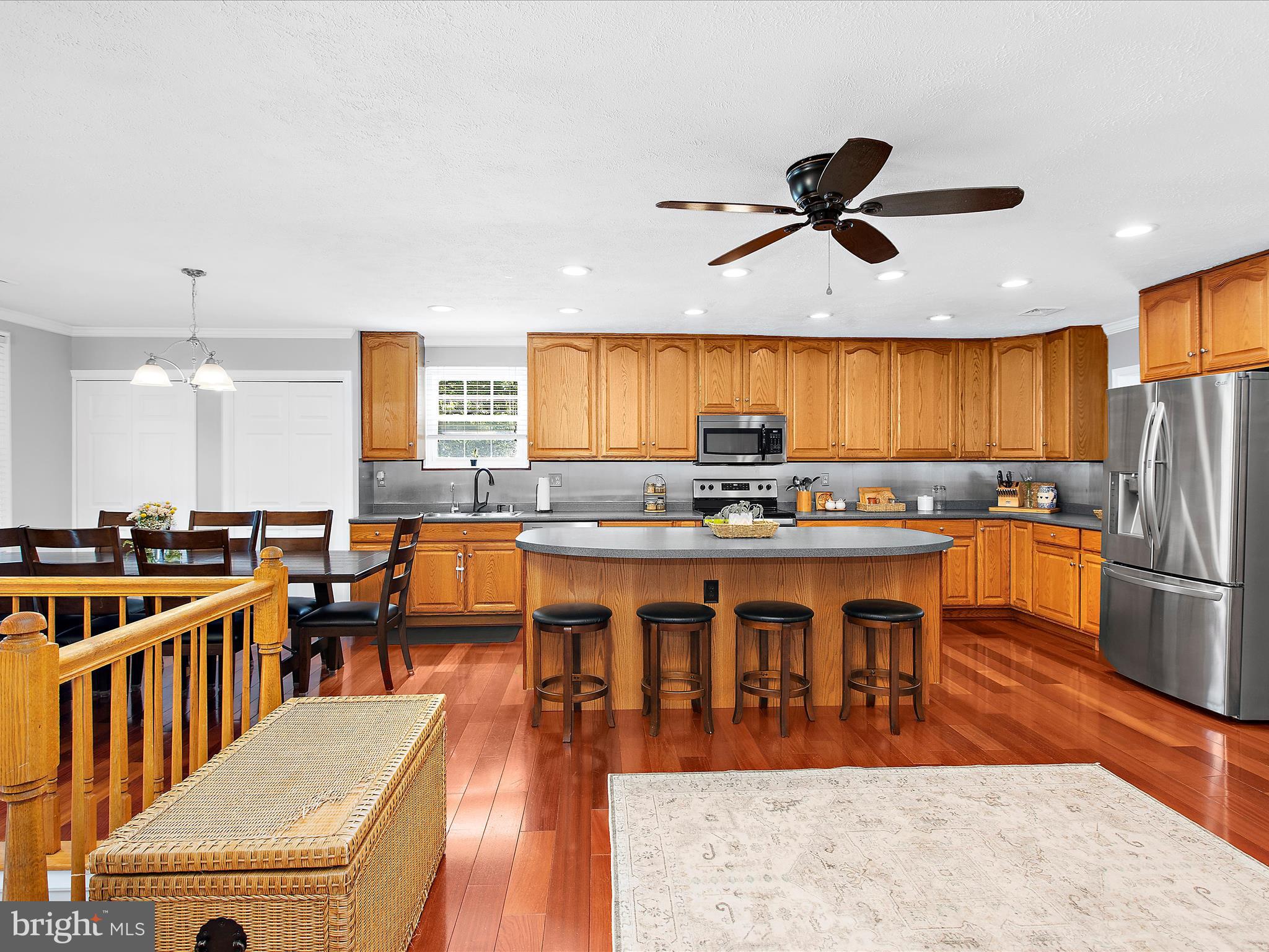 1217 Somerset Road Severn, MD 21144 - Photo 5 of 86 a large kitchen with lots of counter space a sink and stainless steel appliances