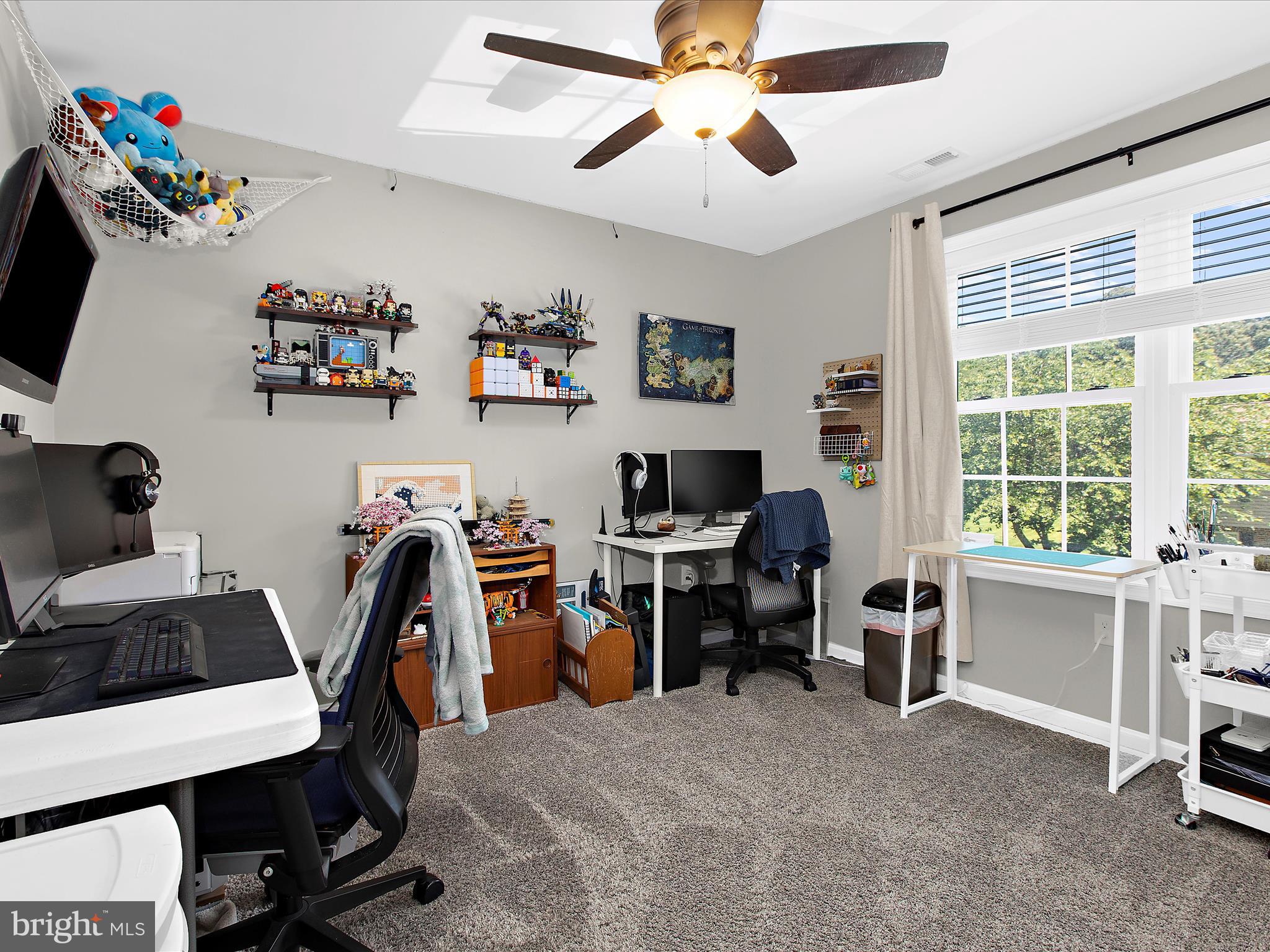 1217 Somerset Road Severn, MD 21144 - Photo 52 of 86 a view of a workspace with furniture and a window