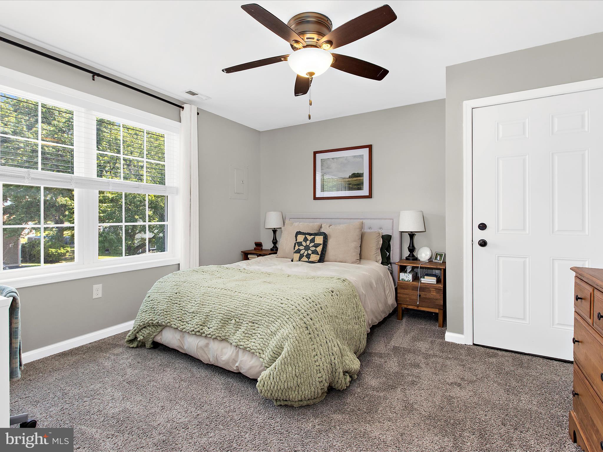 1217 Somerset Road Severn, MD 21144 - Photo 54 of 86 a spacious bedroom with a bed and a window