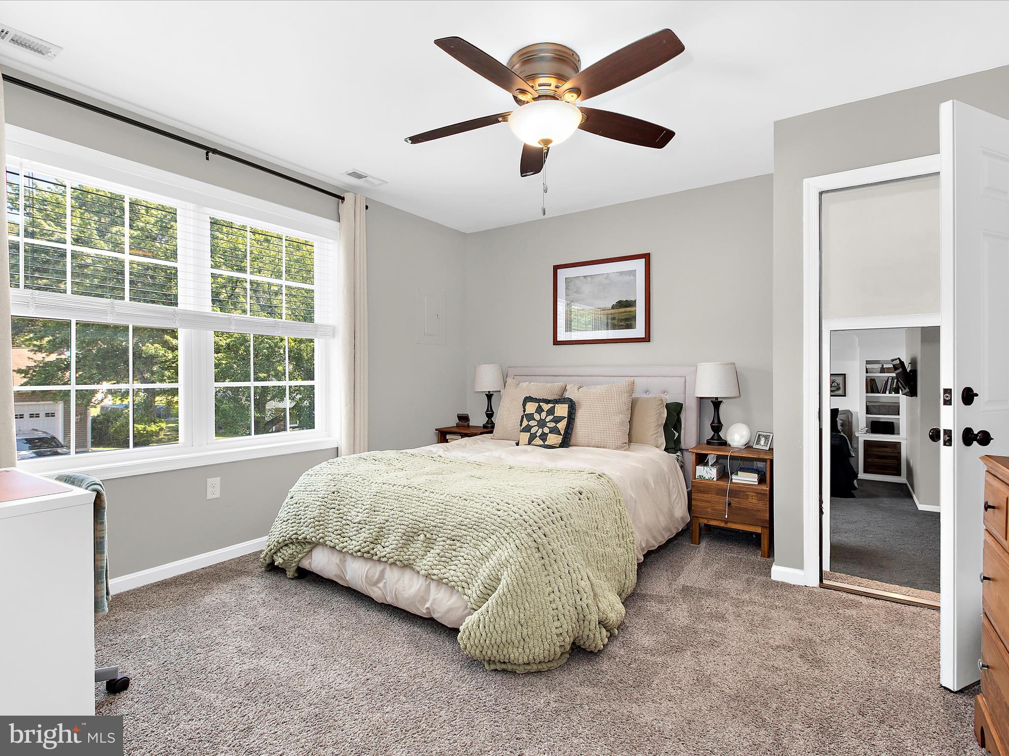 1217 Somerset Road Severn, MD 21144 - Photo 56 of 86 a spacious bedroom with a bed and a large window