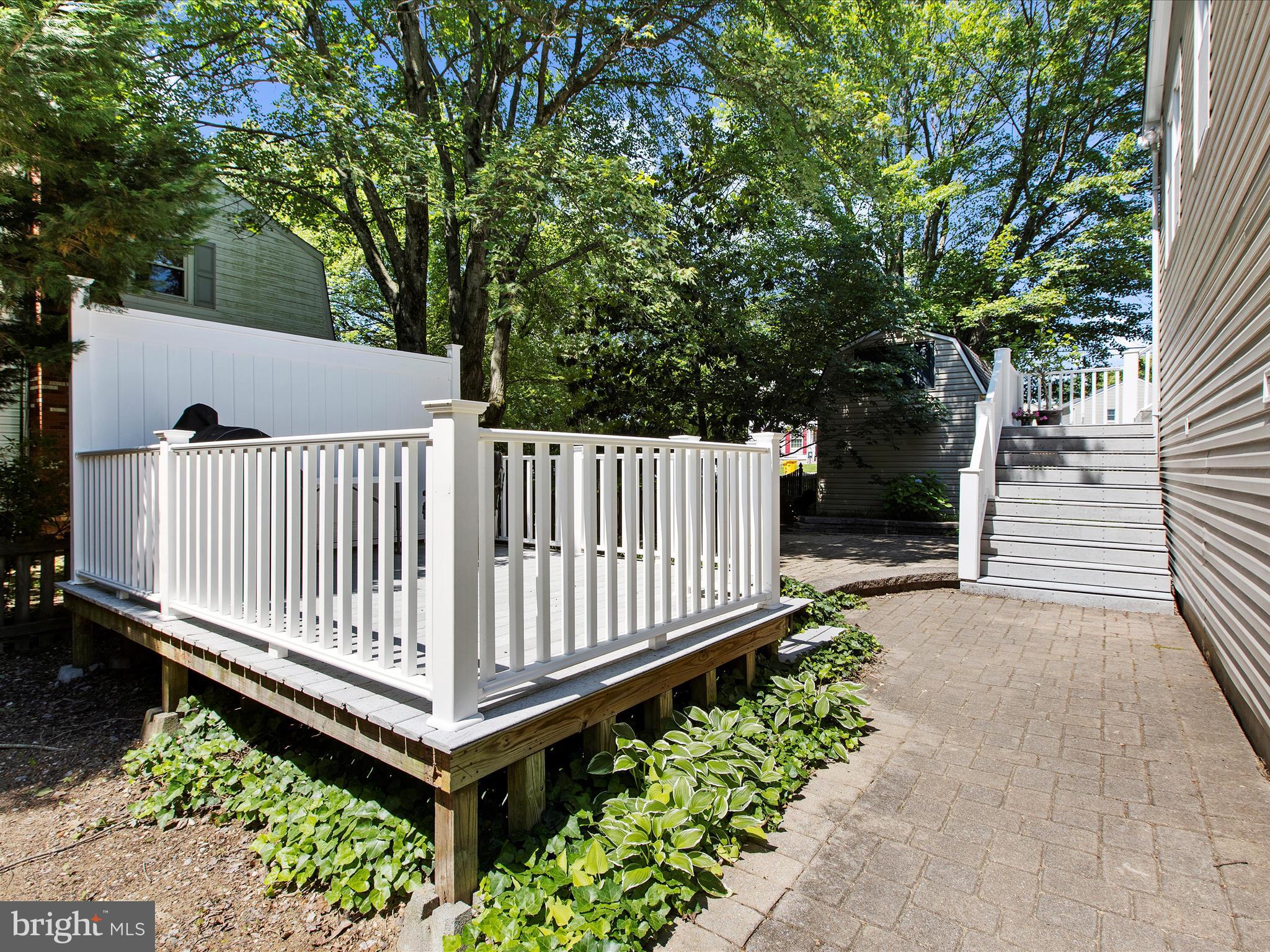 1217 Somerset Road Severn, MD 21144 - Photo 69 of 86 a view of a park with a bench and wooden fence