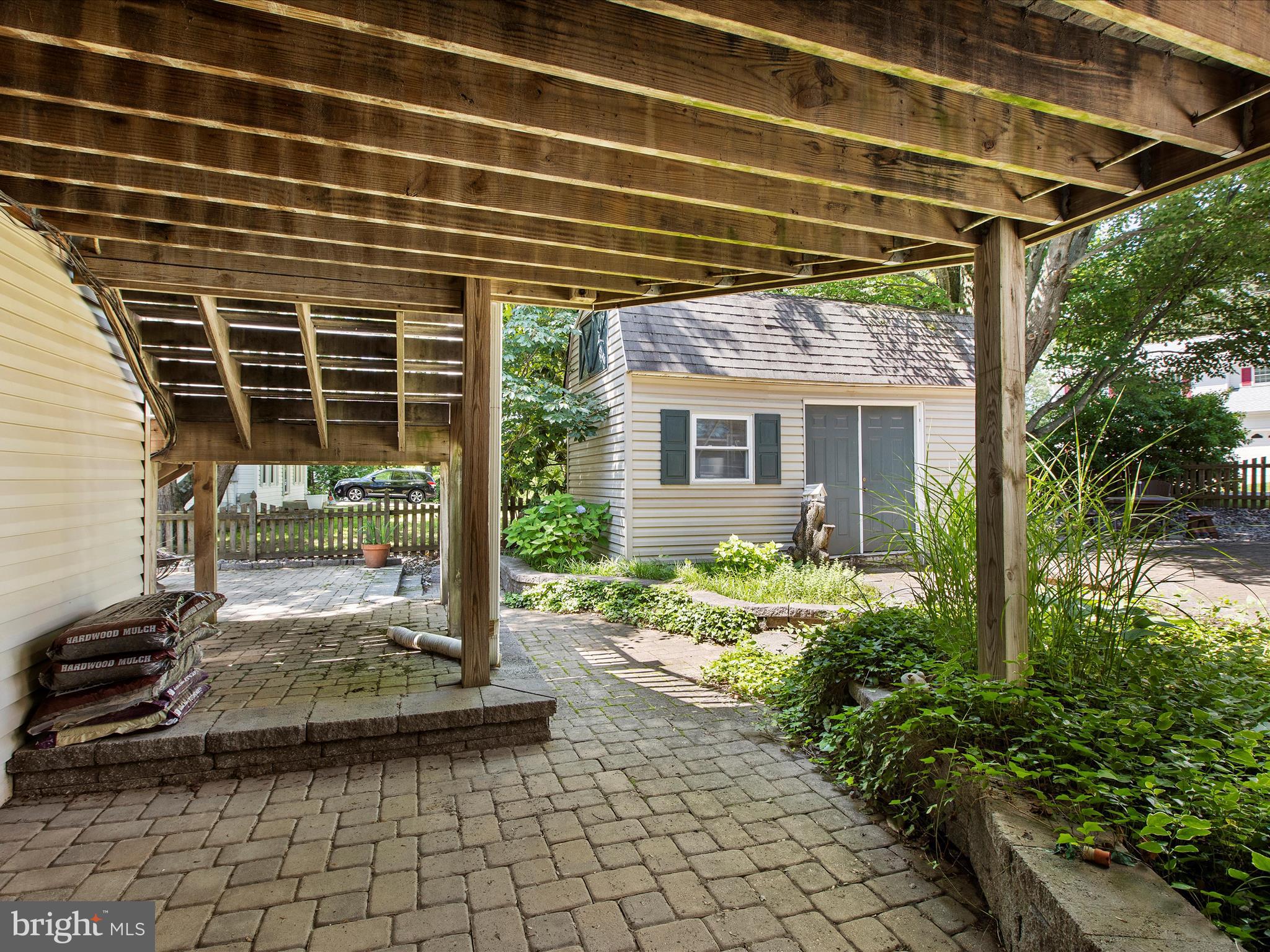 1217 Somerset Road Severn, MD 21144 - Photo 71 of 86 a view of house with backyard and outdoor seating