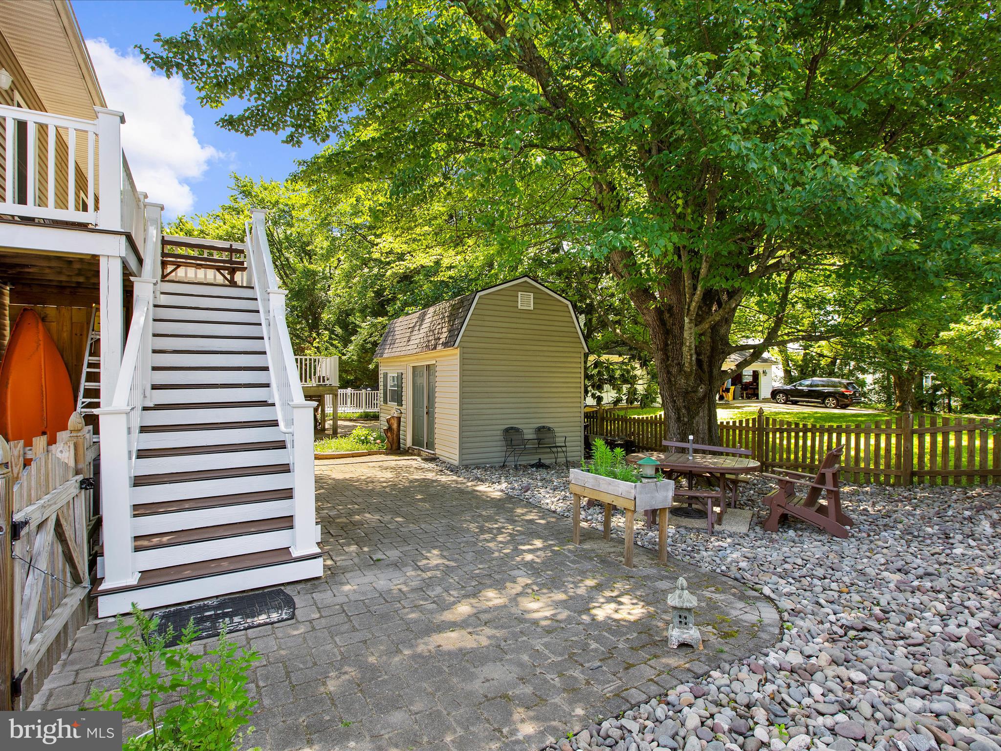 1217 Somerset Road Severn, MD 21144 - Photo 73 of 86 a view of a house with a yard and sitting area