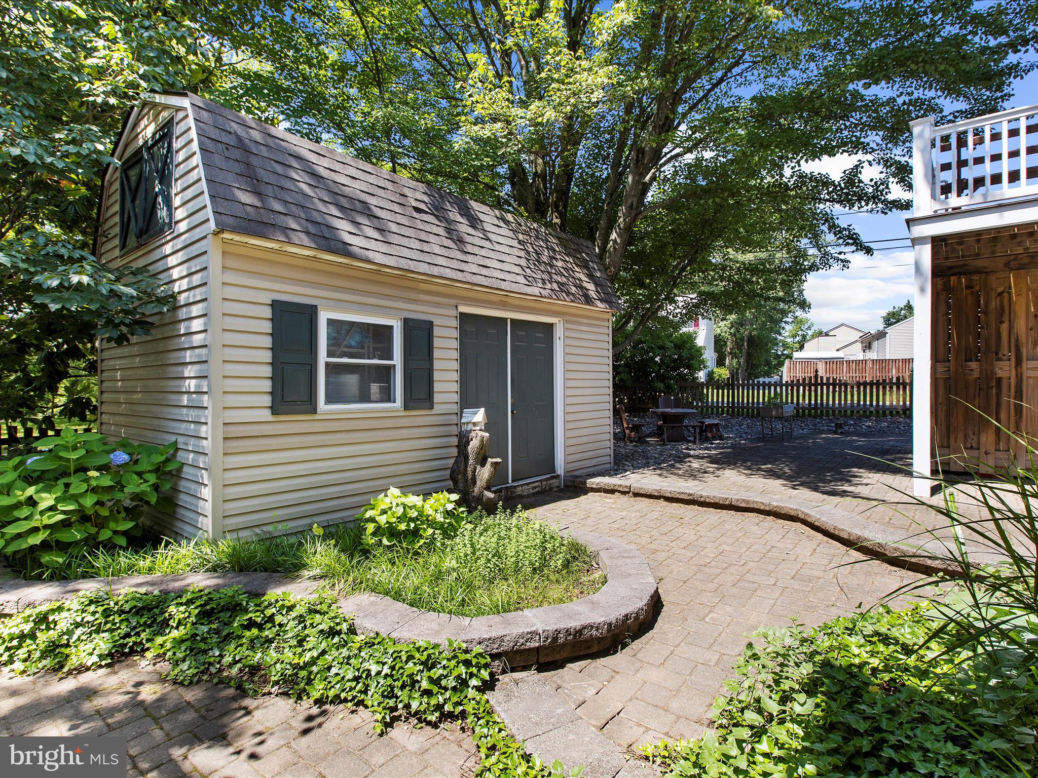 1217 Somerset Road Severn, MD 21144 - Photo 82 of 86 a front view of a house with a yard