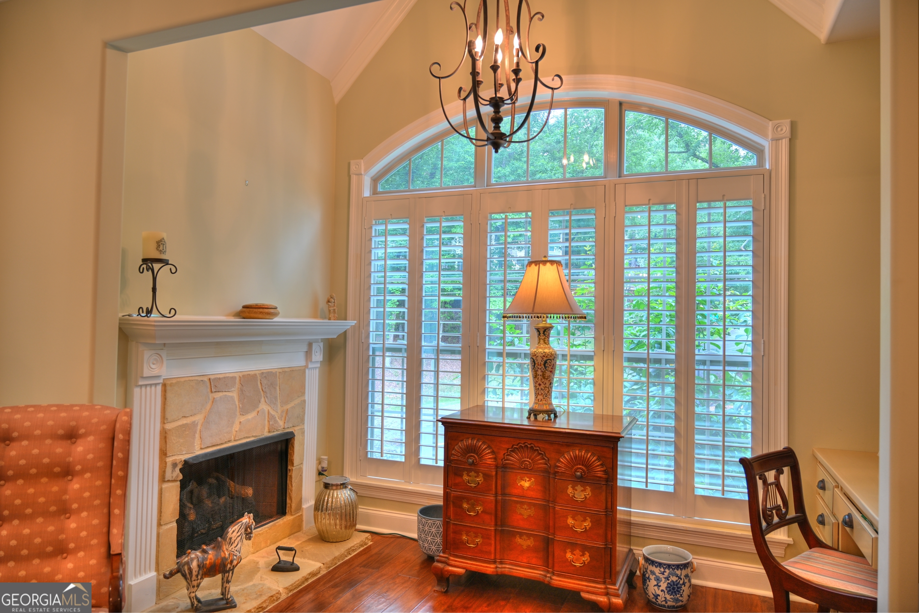 7381 Lullwater Road Columbus, GA 31904 - Photo 11 of 47 a living room with furniture and a fireplace