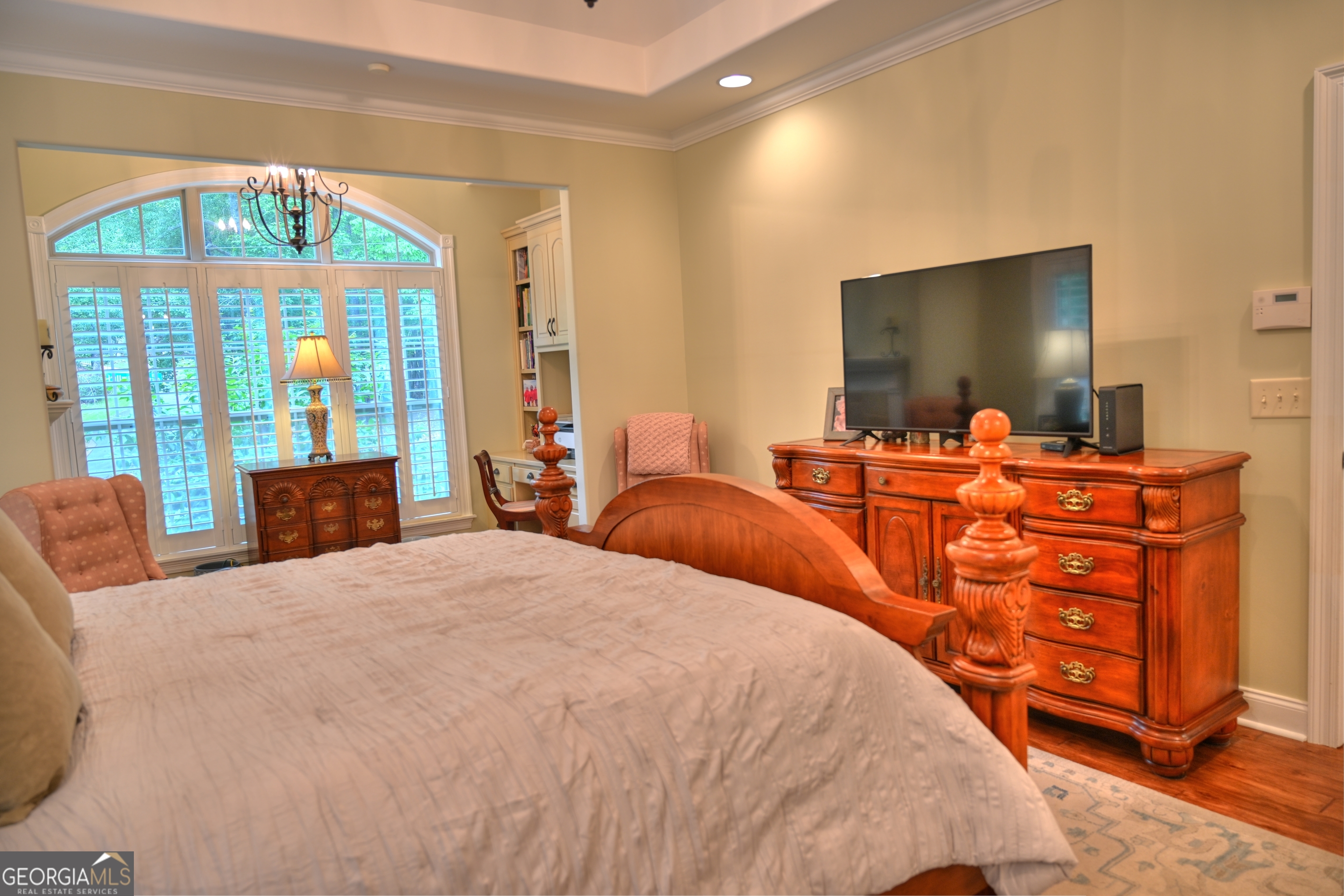 7381 Lullwater Road Columbus, GA 31904 - Photo 13 of 47 a bedroom with a bed and a large window