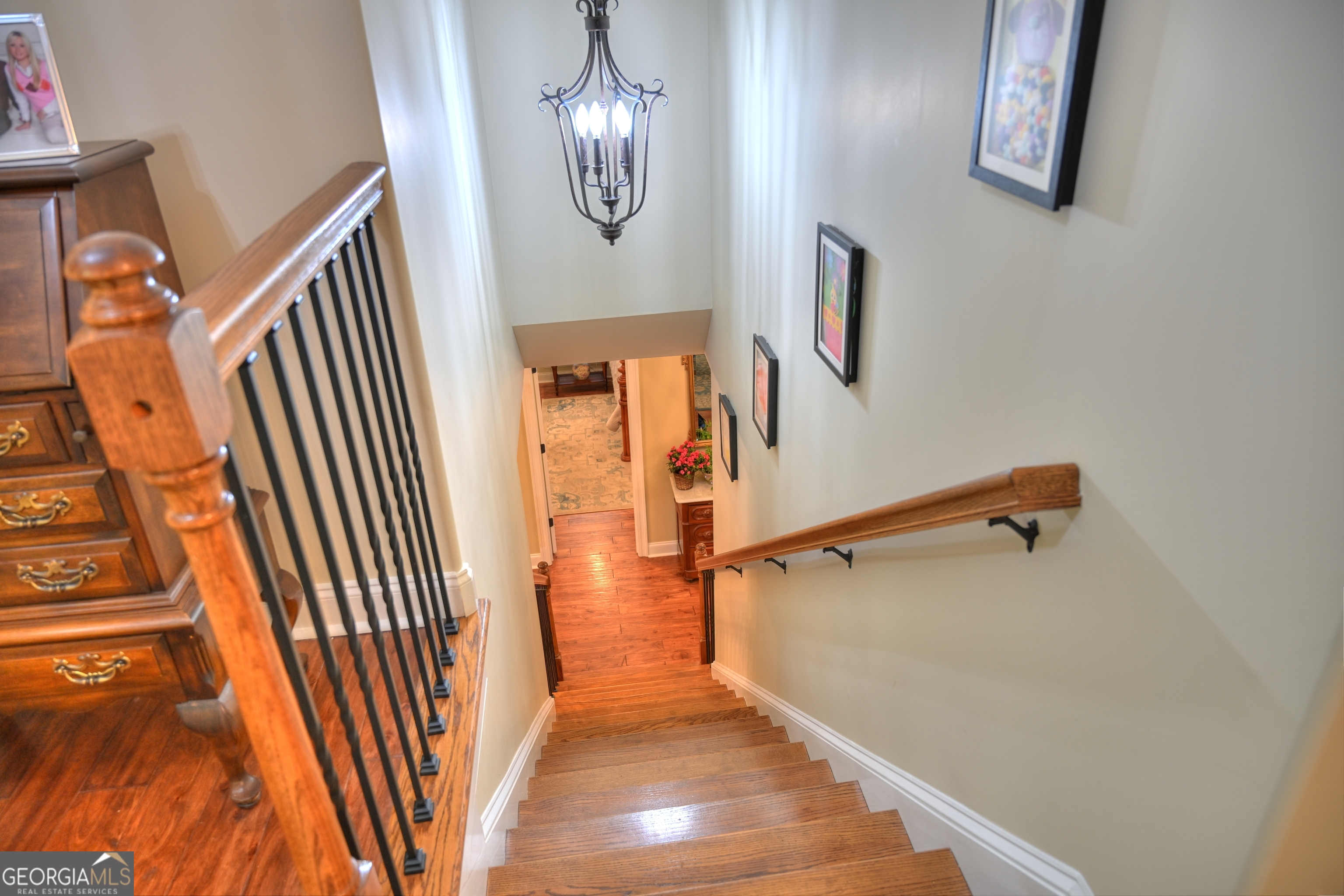 7381 Lullwater Road Columbus, GA 31904 - Photo 20 of 47 a view of a hallway with entryway wooden floor and front door