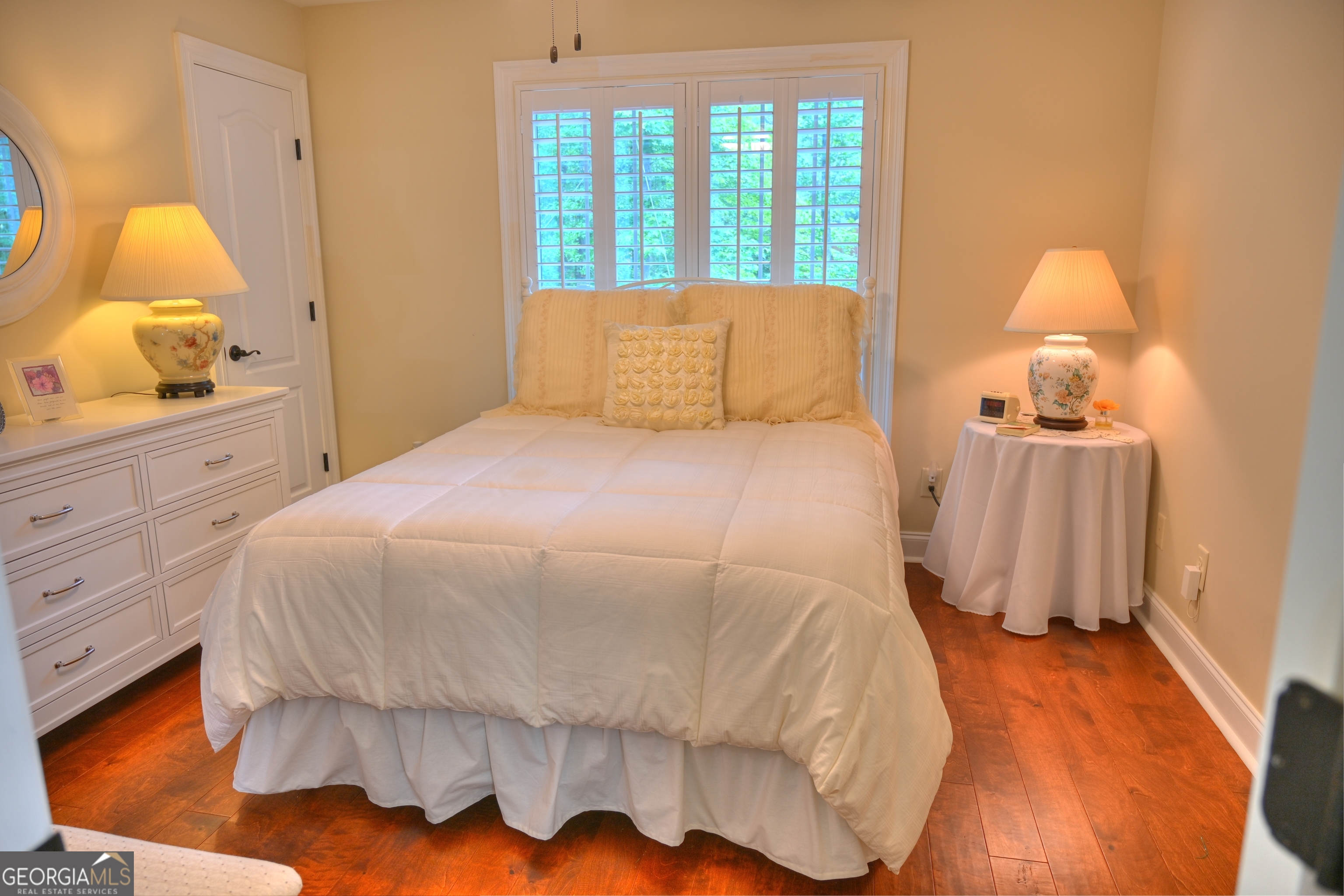 7381 Lullwater Road Columbus, GA 31904 - Photo 25 of 47 a bedroom with a bed and window