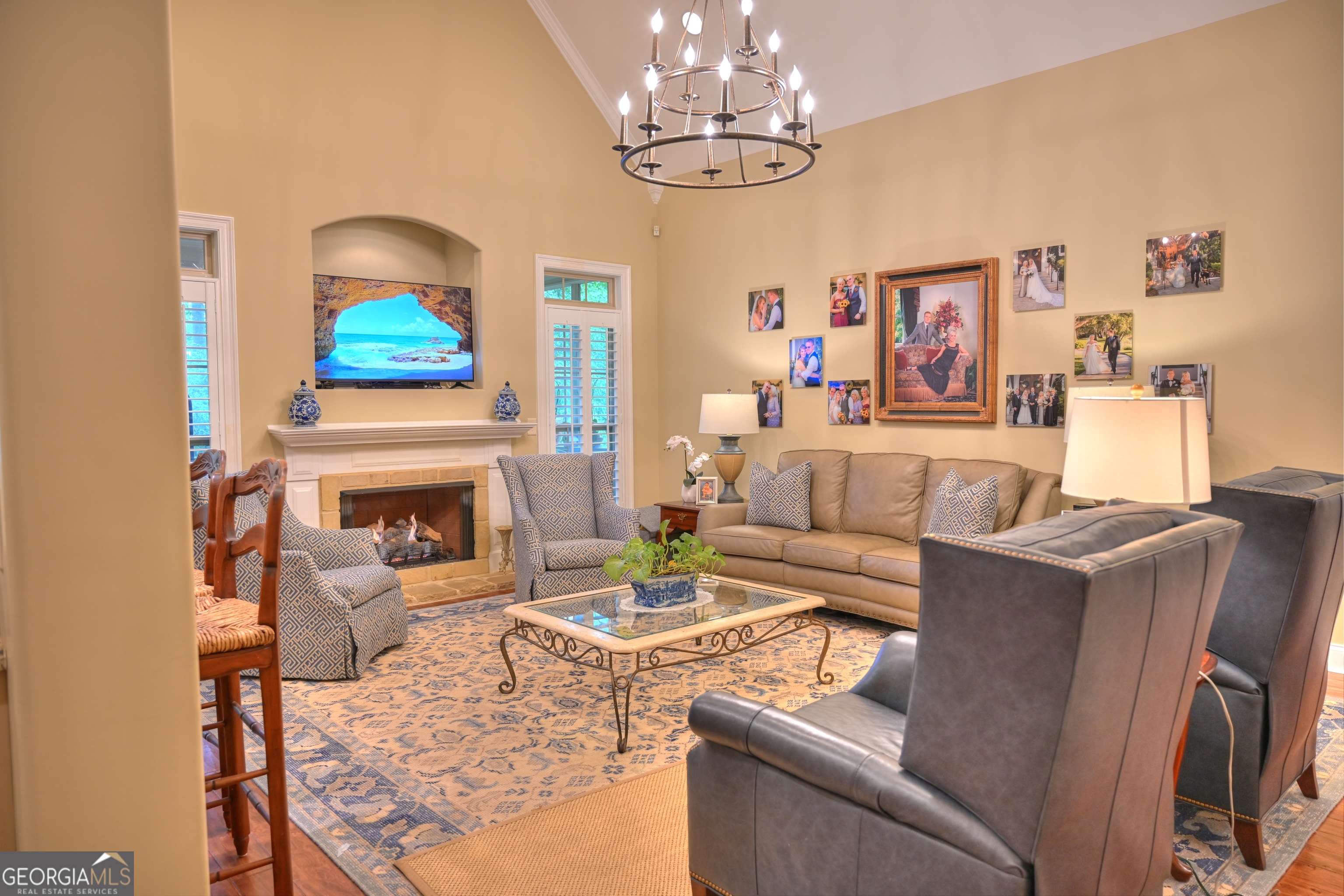7381 Lullwater Road Columbus, GA 31904 - Photo 38 of 47 a living room with furniture and a fireplace