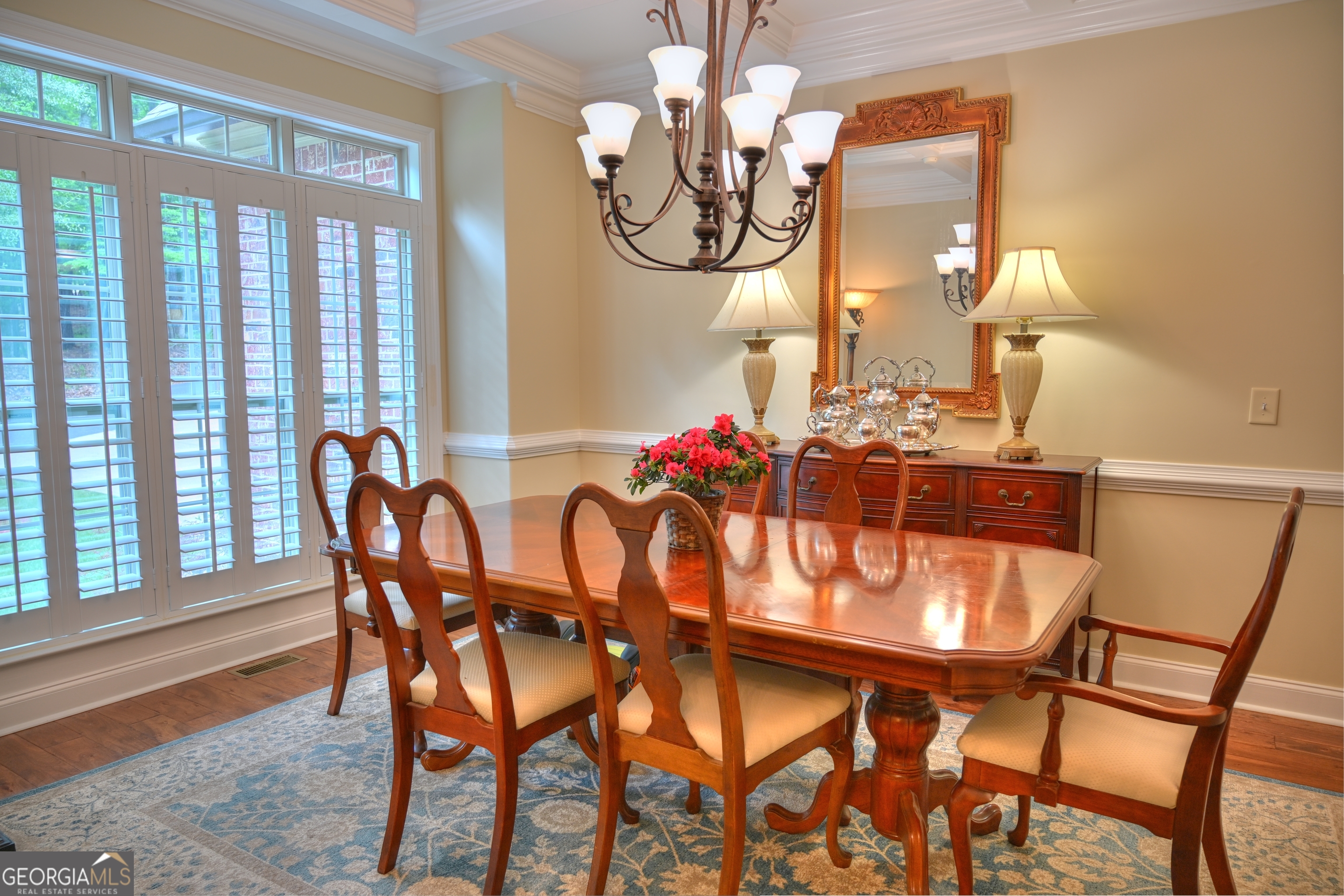 7381 Lullwater Road Columbus, GA 31904 - Photo 43 of 47 a dining room with furniture and chandelier