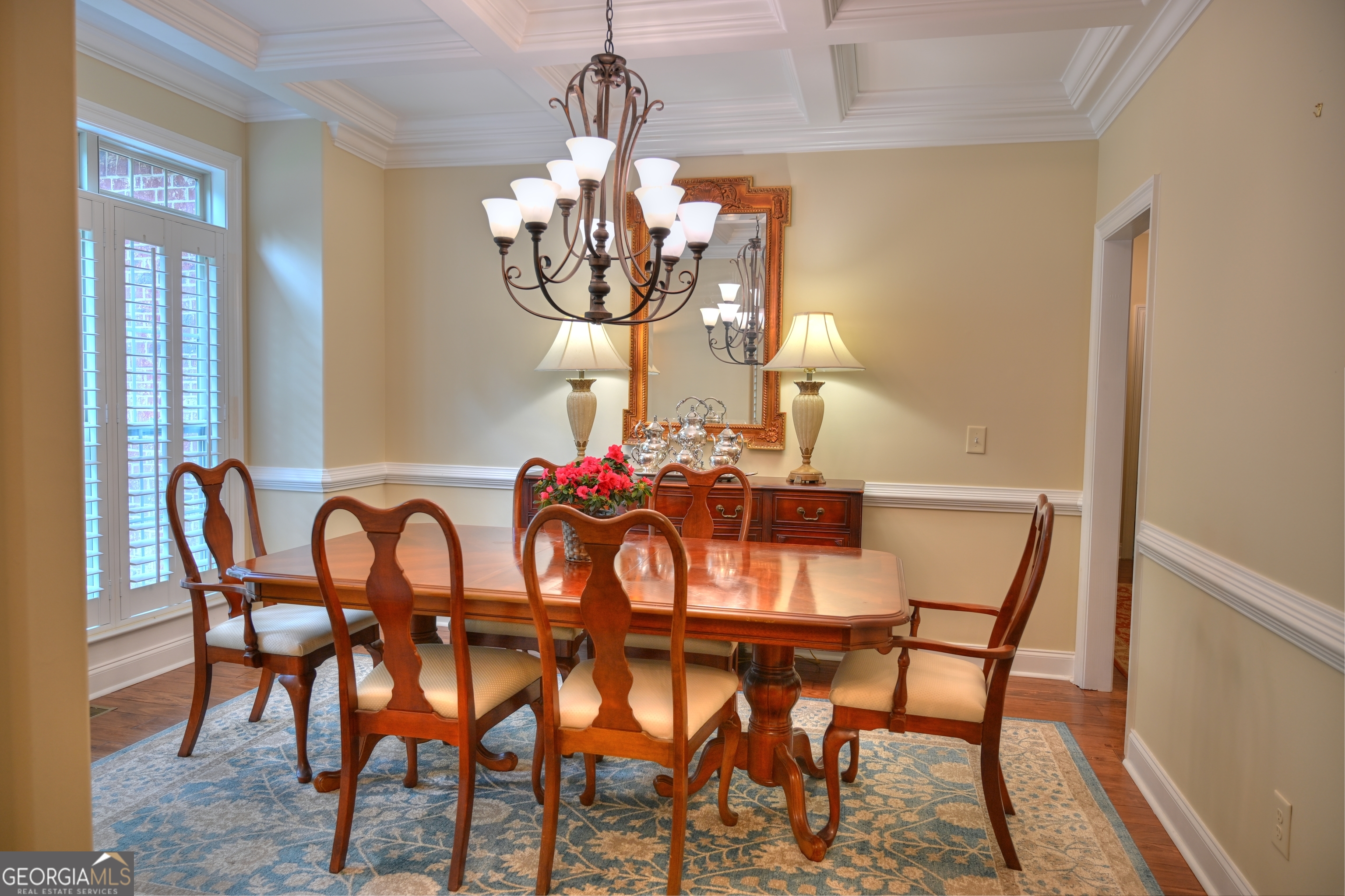 7381 Lullwater Road Columbus, GA 31904 - Photo 44 of 47 a view of a dining room with furniture and chandelier