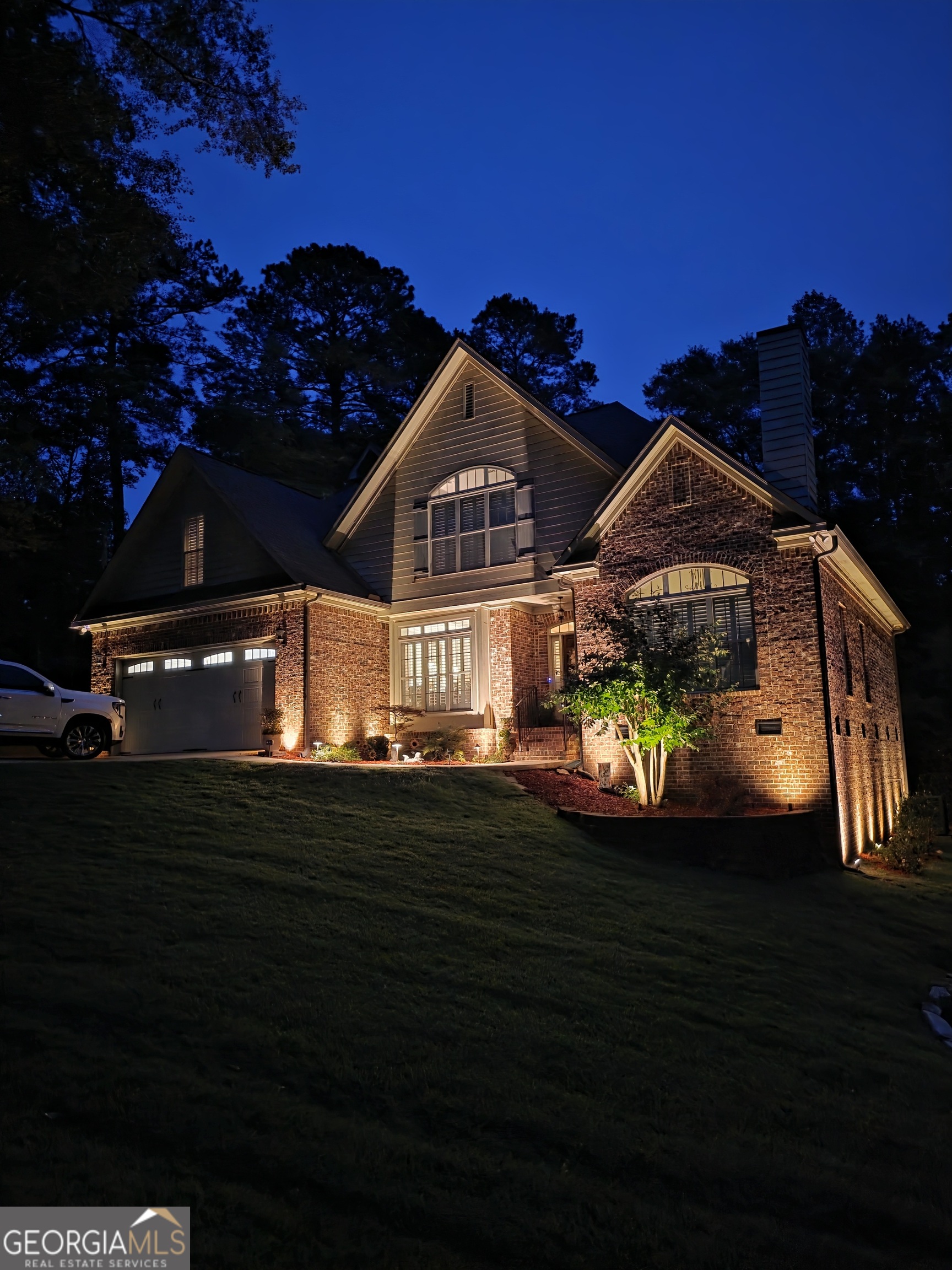 7381 Lullwater Road Columbus, GA 31904 - Photo 46 of 47 a front view of a house with garden