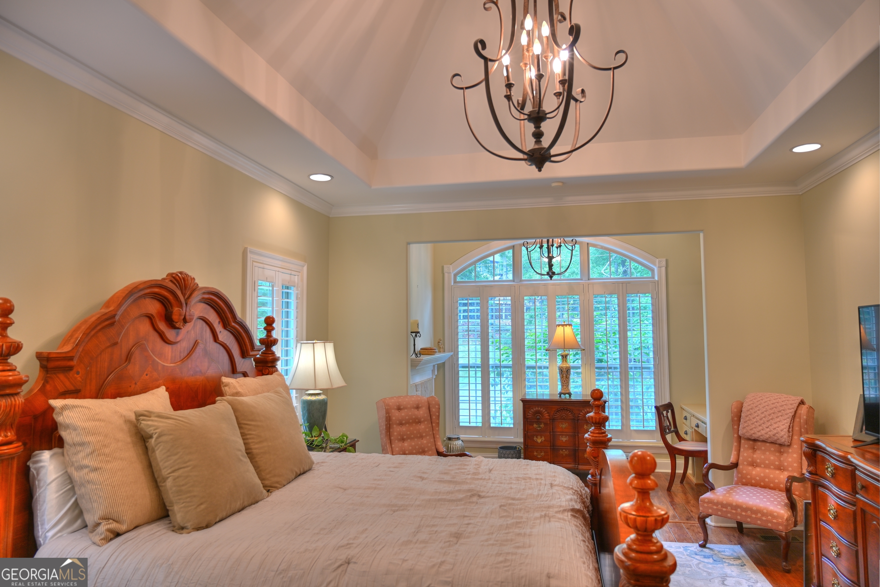 7381 Lullwater Road Columbus, GA 31904 - Photo 5 of 47 a bedroom with a bed and glass windows