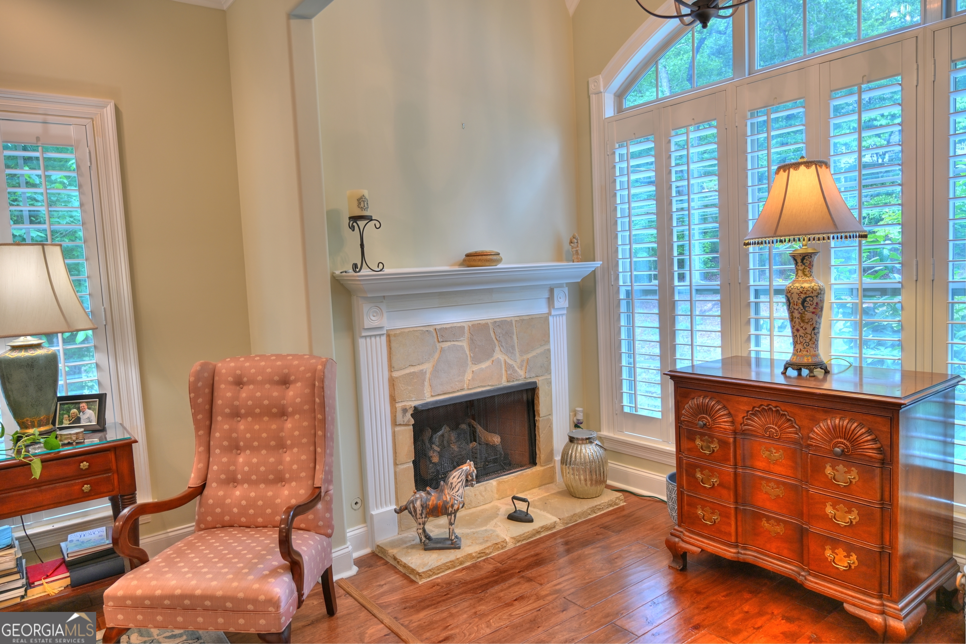 7381 Lullwater Road Columbus, GA 31904 - Photo 10 of 47 a living room with furniture and a fireplace