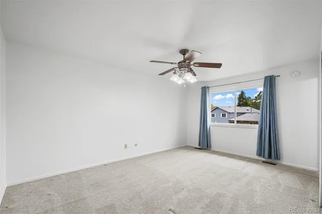a view of a livingroom with wooden floor