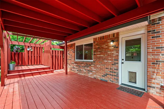 a view of a house with a yard porch and sitting area