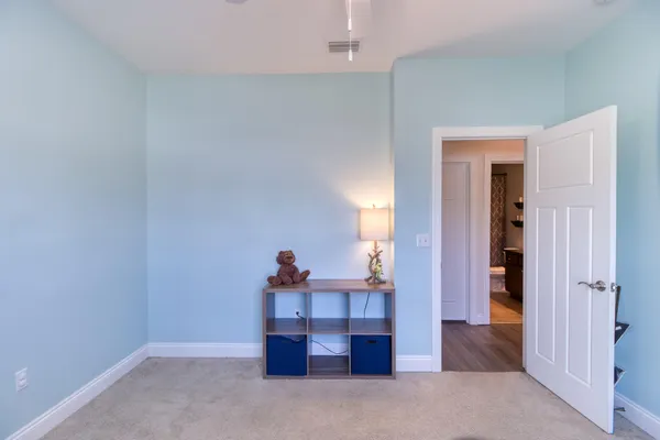 a view of a hallway with closet