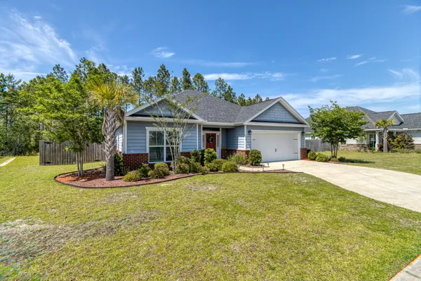 a front view of a house with swimming pool