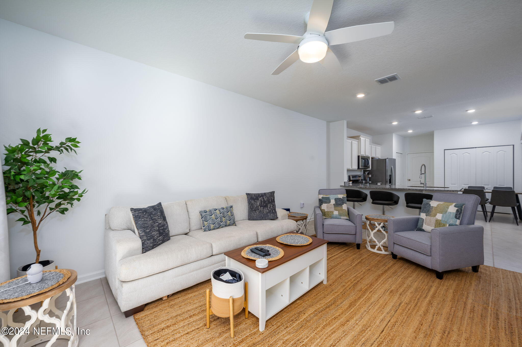 32 Vero Drive St. Augustine, FL 32095 - Photo 15 of 40 a living room with furniture and a wooden floor