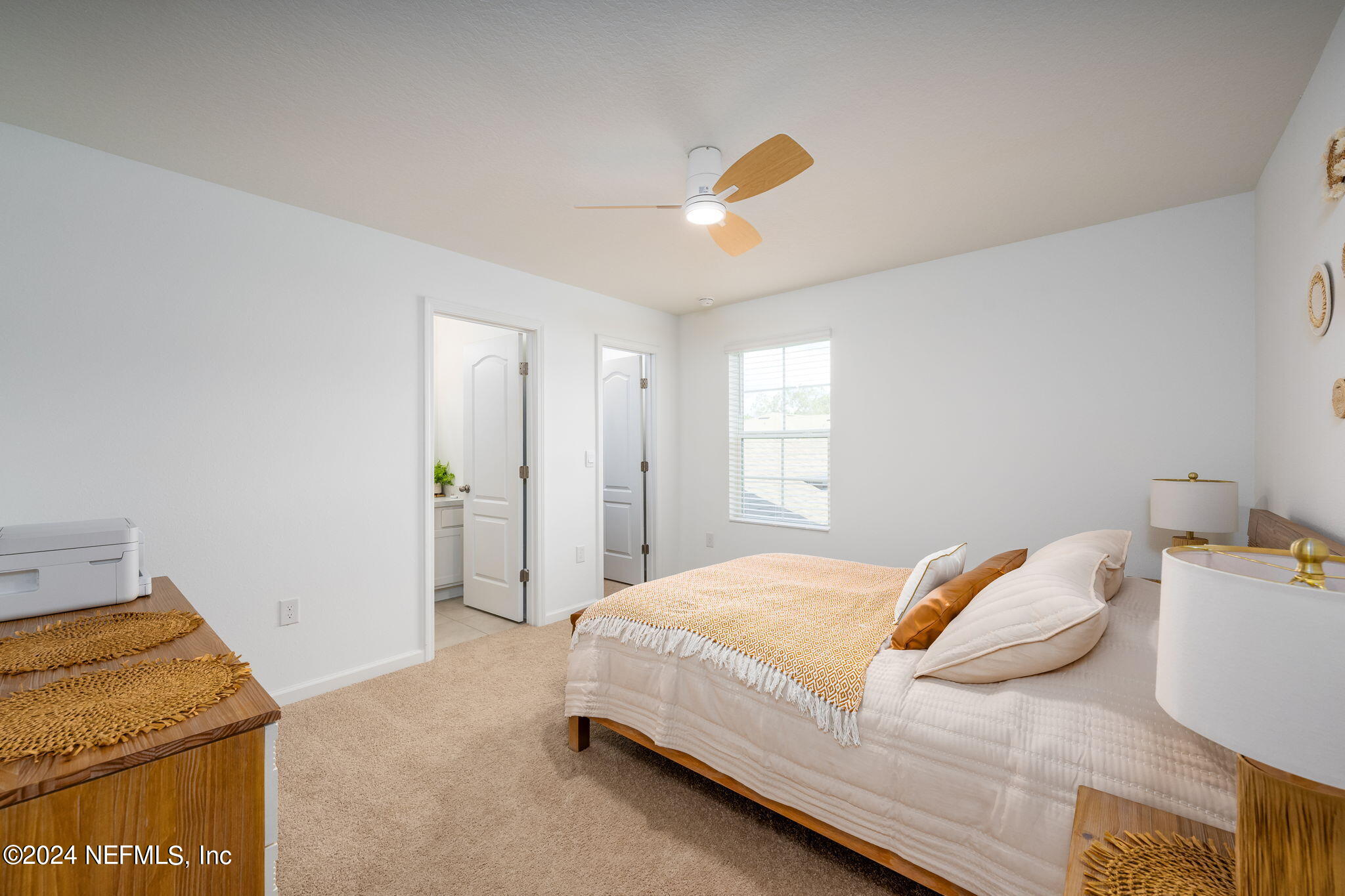 32 Vero Drive St. Augustine, FL 32095 - Photo 17 of 40 a bedroom with a bed and dresser