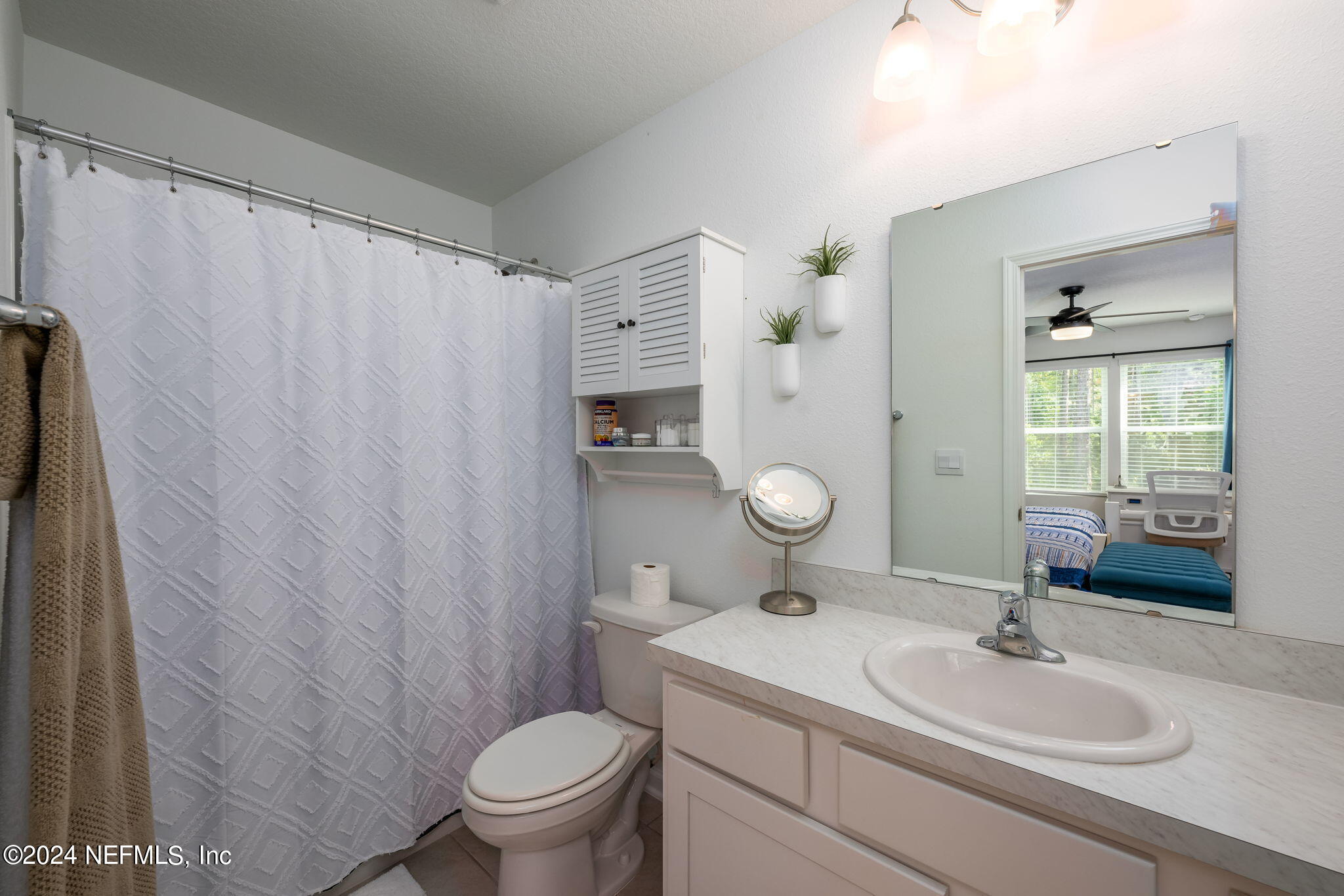 32 Vero Drive St. Augustine, FL 32095 - Photo 22 of 40 a bathroom with a sink toilet and shower