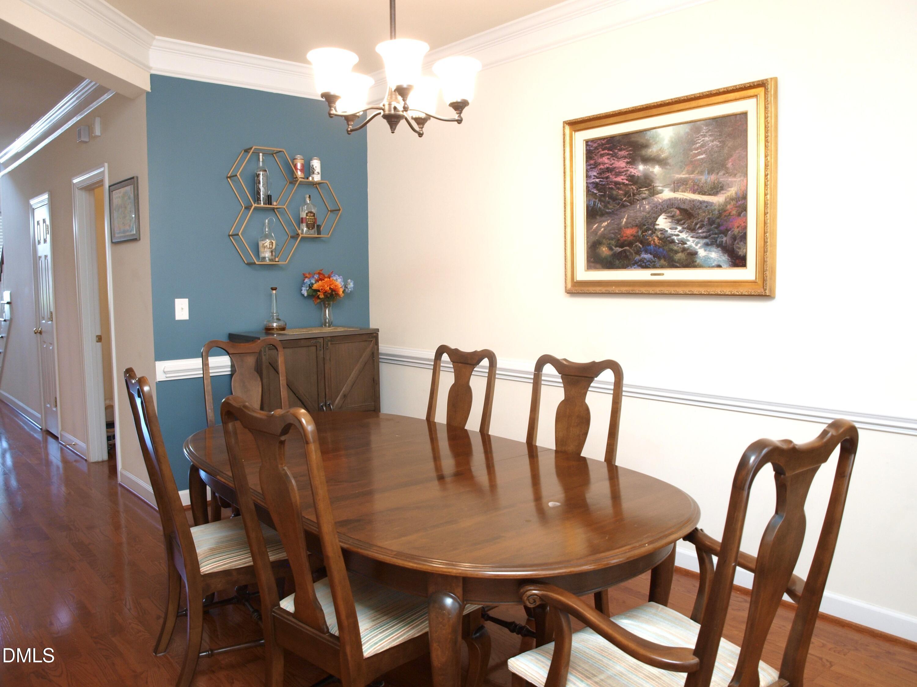5206 Rio Grande Drive Raleigh, NC 27616 - Photo 13 of 37 a view of a dining room with furniture