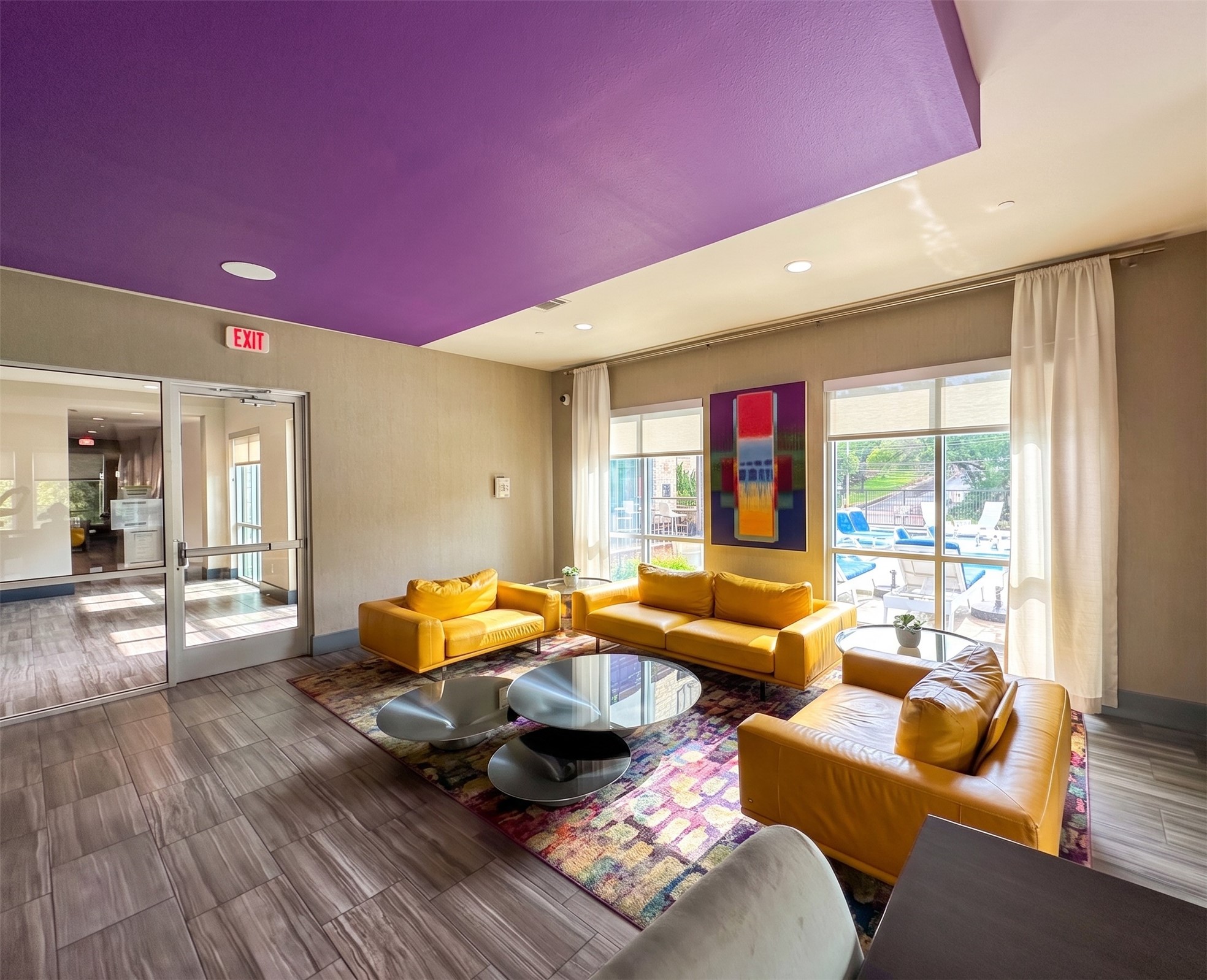 1900 Barton Springs Road, Unit 3036 Austin, TX 78704 - Photo 14 of 19 Sun-filled common area with abundant seating and ample natural light, offering inviting gathering spaces.
