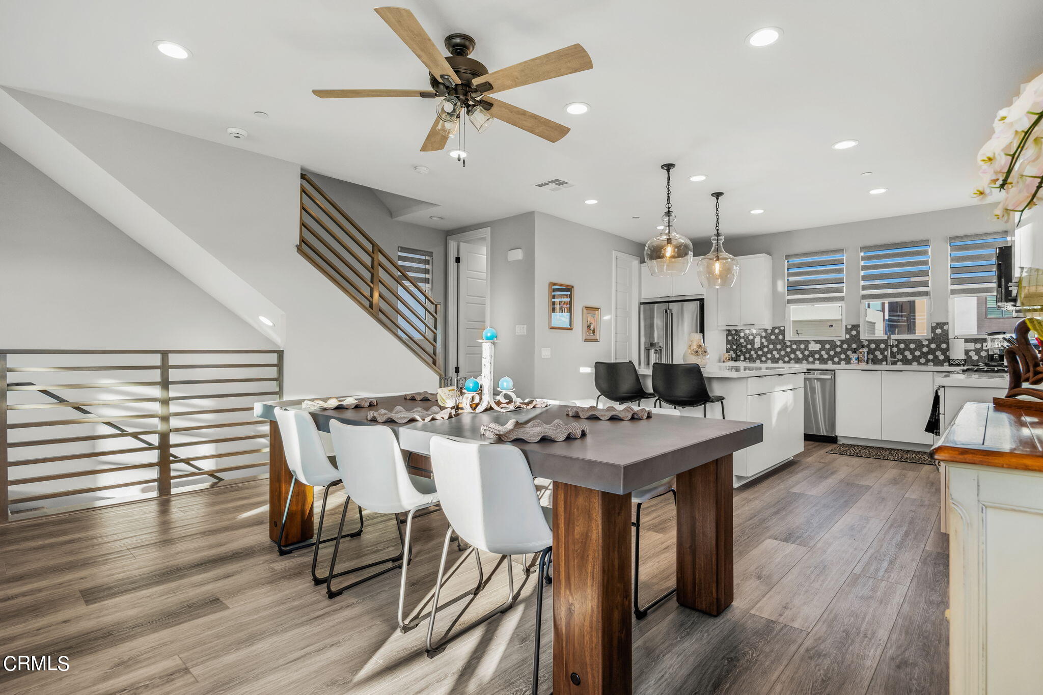 1051 Canal Street Oxnard, CA 93035 - Photo 14 of 54 a view of a dining room with furniture window and wooden floor