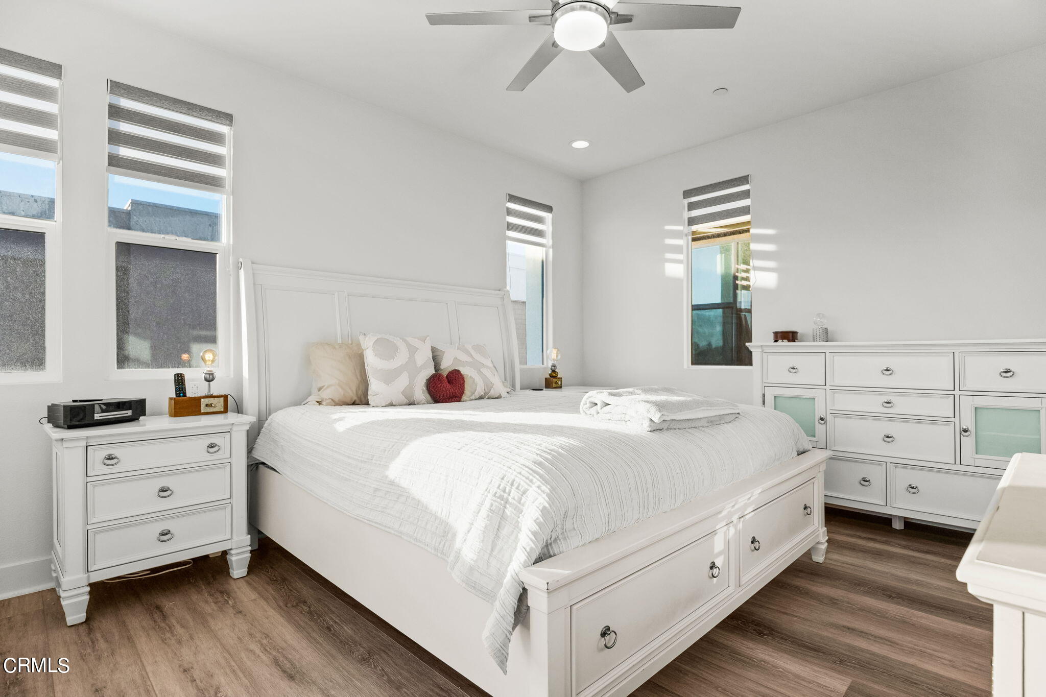 1051 Canal Street Oxnard, CA 93035 - Photo 28 of 54 a bedroom with a bed and a dresser