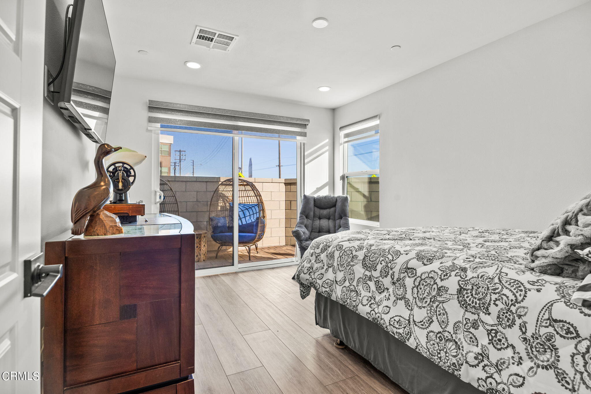 1051 Canal Street Oxnard, CA 93035 - Photo 36 of 54 a bed room with a bed and a window