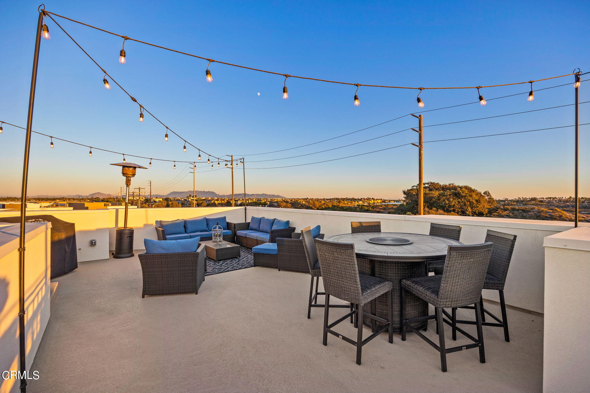 1051 Canal Street Oxnard, CA 93035 - Photo 46 of 54 a view of a terrace with furniture and stove