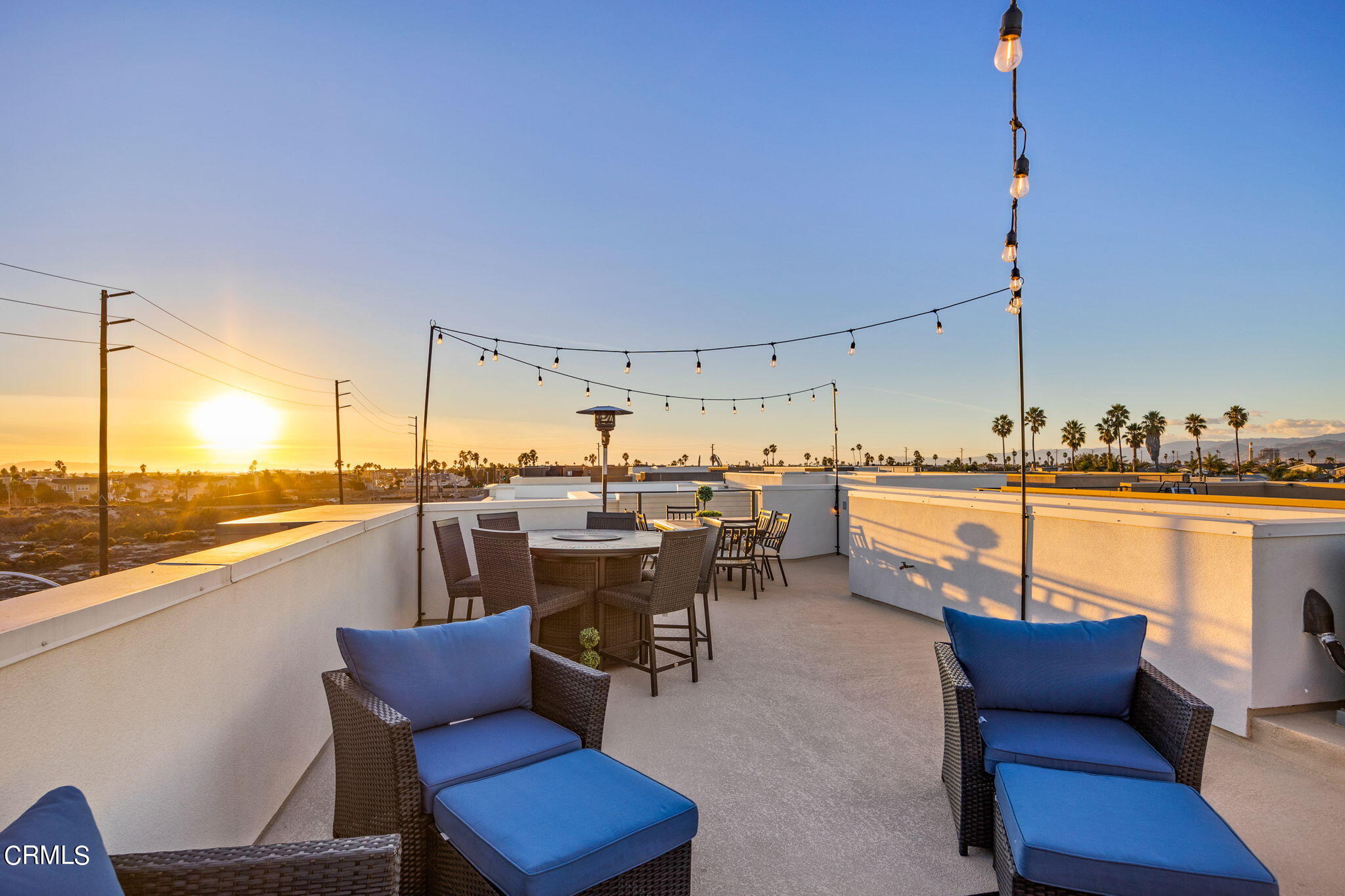 1051 Canal Street Oxnard, CA 93035 - Photo 51 of 54 a living room with lots of furniture and view of chandelier