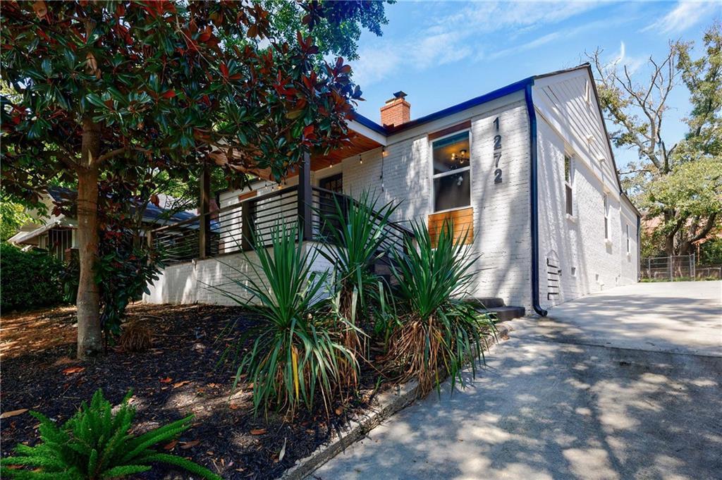 a view of a house with a street