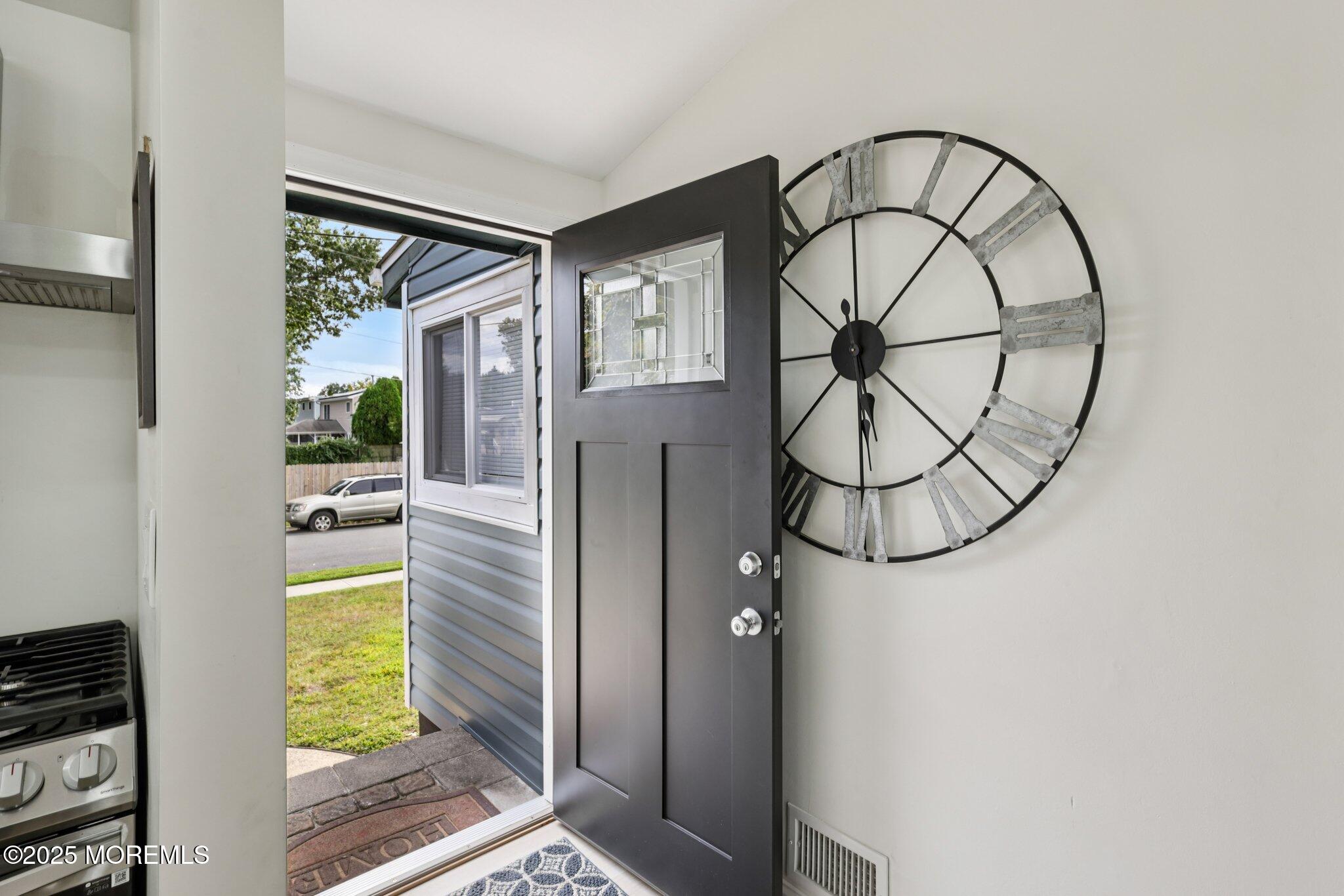 3 Duke Lane Hazlet, NJ 07730 - Photo 12 of 50 a front view of a house with garden
