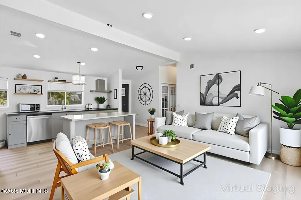 3 Duke Lane Hazlet, NJ 07730 - Photo 14 of 50 a living room with furniture and kitchen view