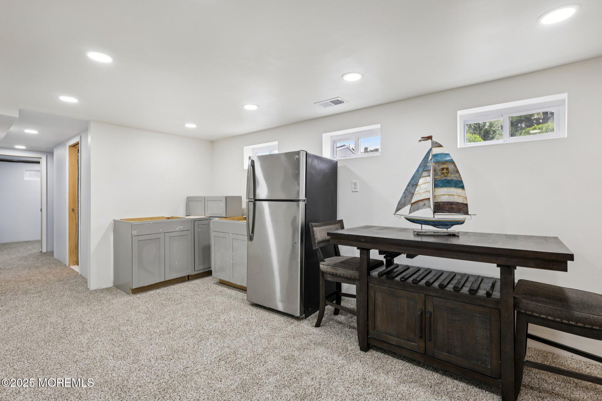 3 Duke Lane Hazlet, NJ 07730 - Photo 22 of 50 a kitchen with a refrigerator and a stove