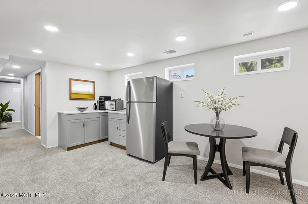 3 Duke Lane Hazlet, NJ 07730 - Photo 23 of 50 a kitchen with stainless steel appliances a refrigerator and a dining table